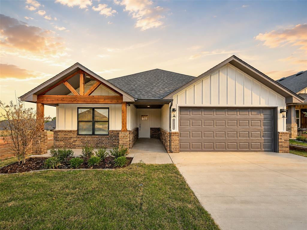 Step into style and comfort with the stunning Holly floor plan, designed with open-concept living and effortless entertaining in mind. From the warm wood-look tile flooring in all common areas to the sleek modern electric fireplace, every detail has been carefully curated to create a welcoming yet sophisticated atmosphere. Enjoy the outdoors year-round with a spacious covered back patio, perfect for relaxing evenings or weekend gatherings. The gourmet kitchen is a true showstopper, boasting custom-built maple cabinets, gleaming quartz countertops, stainless steel appliances, elegant pendant lighting, and a generous walk-in pantry to keep everything within reach. This thoughtfully designed split floor plan with a study ensures privacy and space, with a serene primary suite featuring a large bedroom, expansive walk-in closet, a spa-like garden tub, and a luxurious ample shower. The secondary bedrooms are generously sized with large closets and easy access to a beautifully finished hall bath featuring a fully tiled tub surround.