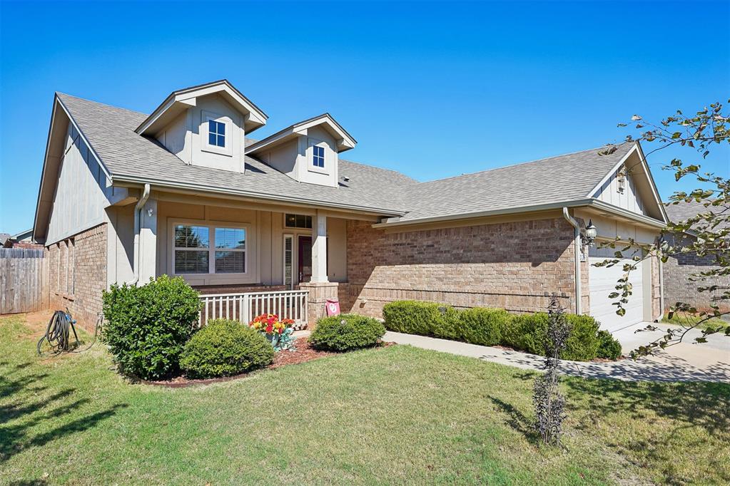 This charming brick home offers an inviting covered front porch, beautiful architectural archways, vaulted ceilings, and an open, light-filled layout designed for comfortable everyday living. The spacious living area flows seamlessly into the dining space and kitchen, featuring rich wood cabinetry, granite countertops, stainless steel appliances, and a gas range. The primary suite offers a relaxing retreat with a double-sink vanity, soaking tub, and separate shower. Additional bedrooms provide flexibility for guests, a home office, or whatever suits your needs. Enjoy the convenience of a two-car garage with in-ground storm shelter, a fenced backyard, and easy access to shopping, dining, and everything Norman has to offer. With its thoughtful layout and welcoming character, this home is ready for its next chapter!