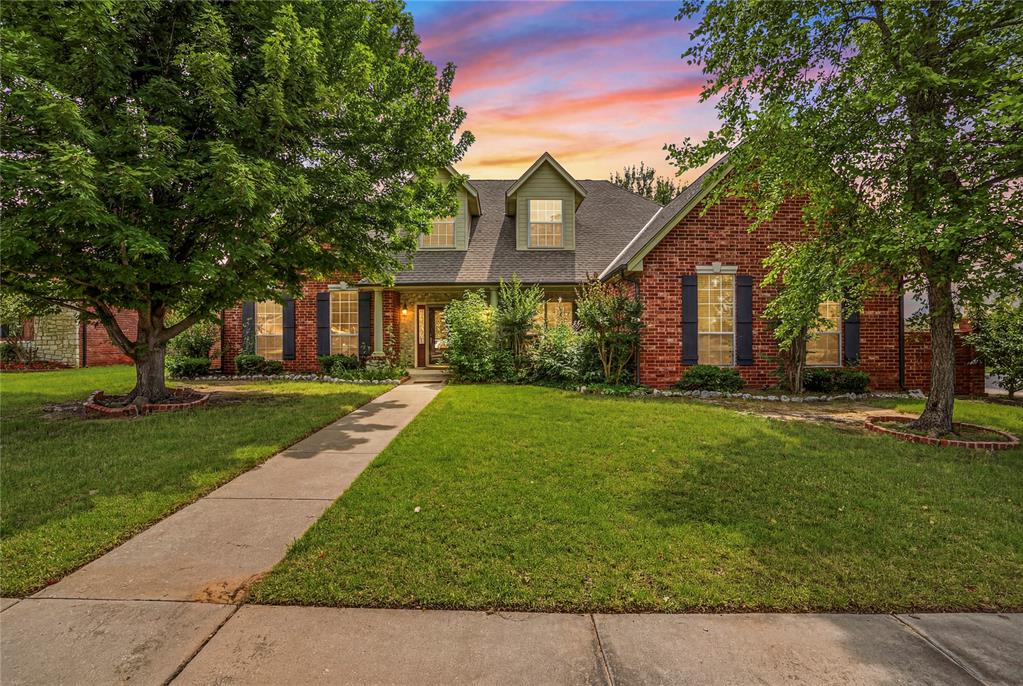 Nestled in Norman’s established Warwick addition, this well maintained two story home offers the space, flexibility, and character that are becoming harder to find! Situated on an oversized 1/3-acre lot shaded by mature trees, the home features 4 bedrooms, 3 and a half bathrooms, 2 living areas, and 2 dining spaces. Inside, you’ll find a floor plan designed to give everyone room to spread out. The formal dining room, dedicated sitting room or office, and spacious main living area each provide their own purpose while still flowing comfortably together. The living room is anchored by a floor to ceiling stone fireplace and overlooks the backyard through large windows that fill the space with natural light. The kitchen offers abundant cabinet and counter space, a gas cooktop, center island, and a bright breakfast area with views of the backyard. The primary suite is conveniently located on the main floor and features dual vanities, a soaking tub, separate shower, walk-in closet, and plenty of natural light. The secondary bedrooms are comfortably sized and offer flexibility for family, guests, hobbies, or work from home needs. Outside, the oversized backyard is one of the home’s standout features. Mature trees provide shade throughout the yard, while the extended covered patio creates a comfortable space for relaxing or entertaining. With a  3 car garage, timeless character, and room to grow both inside and out, this Warwick home is ready for its next chapter. Schedule your showing today!
