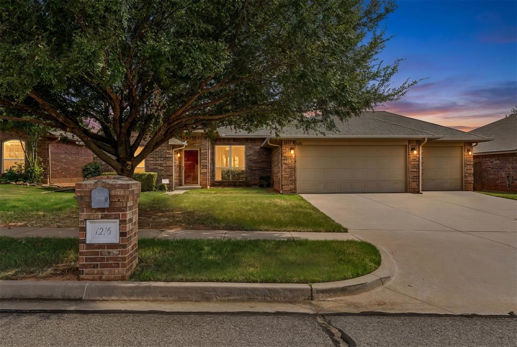 Imagine coming home to no rear neighbors, just open sky and a tree-lined lot stretching beyond your back fence. This kind of privacy in a 4-bedroom, 2.5-bath, 3-car garage home at this price point is hard to find in Norman.  That privacy carries into a south-facing covered patio that stays cool and shaded through the hottest Oklahoma afternoons — no glare, no scorching sun, just backyard living from morning coffee to evening wind-down. Inside, an open floor plan invites you in, anchored by a gas fireplace with a stained wood mantle in the living room. It flows into a stunning kitchen with granite countertops, stainless steel appliances, a walk-in pantry, and a breakfast bar big enough to gather six. Double French doors frame a peaceful view of the backyard, and a split floor plan gives everyone room to breathe, including a second living area perfect as a home office or wellness space.  Retreat to the primary suite and find tall ceilings, dual vanities, a soaking tub made for unwinding, and two full walk-in closets, so nobody has to become 'the one who gives up their side.  This home doesn't just look move-in ready — it's engineered for effortless living. A full smart home package — Nest video doorbell, smart lock, smart thermostat, smart sprinkler system, smart garage opener — transfers seamlessly to you, built-in value from day one! The spacious 3-car garage boasts a “Flowwall” storage system with 50+ hooks and room to expand, so your tools, gear, and hobbies finally have a home. Fresh interior paint, doors, trim, and hardware give every room a polished, upscale feel. Walk to the school bus stop, stroll to Sutton Wilderness Trail Park or Deerfield Park's pond, and enjoy quick access to Norman North High School, I-35, and everyday shopping. Homes with this combination of privacy, upgrades, and location don't stay available long — schedule a time to see it today, and ask about a feature that could even lower your insurance premium!