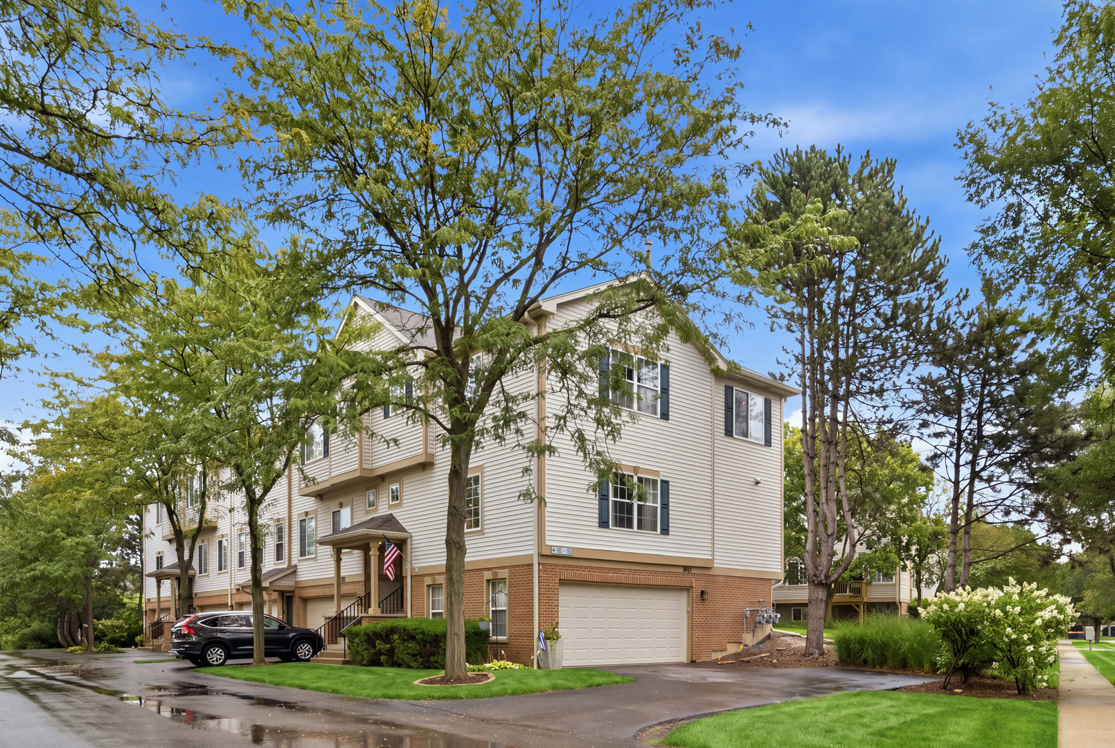Welcome home to this beautifully updated 3-bedroom, 2.5-bath, end-unit in the desirable Southwicke community! Thoughtfully upgraded throughout and filled with stylish details, this home offers a spacious, open layout, impressive storage, and numerous recent improvements. From the moment you step inside, you'll appreciate the attention to detail. The inviting foyer features elegant wainscoting and leads seamlessly into the main living level. Here, tall ceilings and an open-concept design connect the spacious living room, dining area, and kitchen, creating a bright and welcoming space that's perfect for both everyday living and entertaining. The kitchen offers an abundance of cabinetry and counter space while maintaining an open flow into the dining area. The beautifully designed dining space is highlighted by a custom accent wall with built-in cabinetry added in 2025, giving the room a sophisticated, high-end feel. Just off the kitchen is a brand-new balcony overlooking the beautifully maintained and manicured grounds-the perfect place to relax outdoors. Upstairs, you'll find three generously sized bedrooms and two full bathrooms. The spacious primary suite feels like a private retreat, featuring a large walk-in closet with custom built-in organization for exceptional storage. Renovated in 2026, the bedroom also features fresh paint, a new ceiling fan, and luxury vinyl plank flooring. The primary ensuite bathroom is truly a showstopper. Completely remodeled in 2026, this spa-inspired space features a custom shower accented with stunning imported Italian tile and beautiful finishes throughout. Two additional bedrooms offer ample closet space with custom built-in organizers, while the second full bathroom received a stylish refresh in 2024. The lower level provides a well-appointed laundry area, an oversized storage room, and direct access to the attached two-car garage. An extra-large driveway provides plenty of additional private parking. Additional updates and features include a reverse-osmosis system, painting throughout (2024), furnace and air conditioning (2023), water heater (2023), garage door (2023), and roof and gutters (2021). The association board has approved plans to extensively update the landscaping, scheduled to be installed in the coming months. Just down the street, you'll find a charming neighborhood playground and walking path. Southwicke offers beautifully maintained surroundings while remaining conveniently located near shopping, dining, and everyday amenities. With its spacious layout, extensive updates, designer touches, and desirable end-unit location, this home is truly move-in ready. Don't miss your opportunity to call 160 Monarch 'home'!