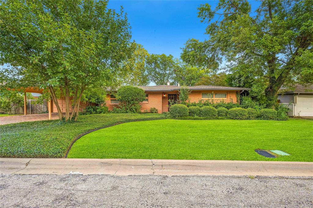 Charming, well-maintained home in a peaceful North Richland Hills neighborhood. This spacious one-story features original hardwood floors, a beautifully updated kitchen, and a large main bedroom with a private en-suite bath. The open day room offers stunning views of the in-ground diving pool—perfect for relaxing or entertaining.
Sitting on a generous, tree-lined lot, the property also includes a two-car, two-story detached garage with a full workshop and upstairs space—ideal for hobbies, storage, or creative projects.
Whether you're hosting friends or enjoying quiet evenings by the pool, this home delivers comfort, character, and room to grow. A must-see!