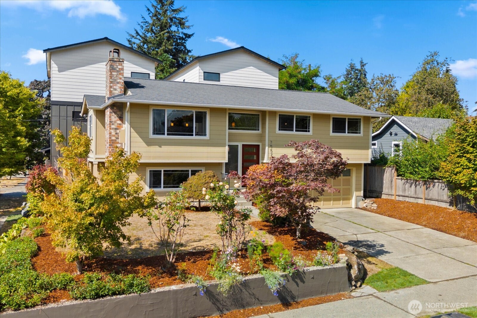 Move-in Ready & thoughtfully updated split-level home in spectacular West Seattle! Located on a quiet street yet minutes from neighborhood eateries, coffee shops and parks, this home has all the right ingredients. The highly functional floorplan includes the living room, dining room, eat-in kitchen, full bath and three bedrooms on the main floor. Below you'll find a 4th bedroom, another full bath, second living room, laundry and attached 2-car garage. Just some of the features that make this home special: olive wood floors, custom dining room built-ins, kitchen with double-oven, a fireplace on each floor, and a heat pump for A/C. Outside you'll find a right-sized front yard perfect for lounging or gardening and a fenced backyard for pets. Multi-generational potential with garage entrance to the lower level. Fee Simple, not a condo/no HOA. Great investment/Airbnb opportunity.