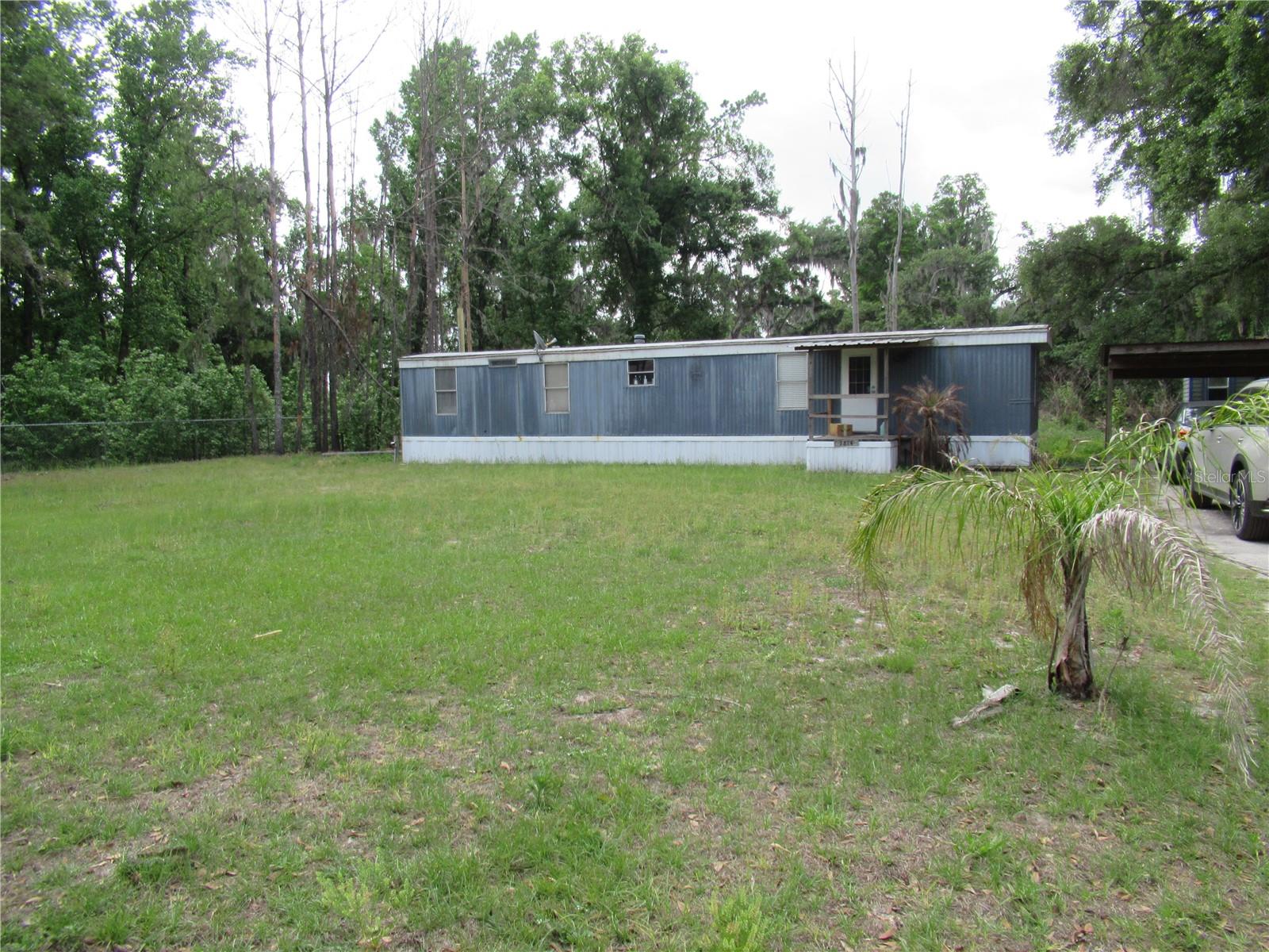 Short Sale. "Short Sale"  Charming Rural Home with Pond and AcreageDiscover the perfect blend of tranquility and rural living in this delightful home, ideally suited for those seeking land with a pond.Property Features Pond: The property includes a 25-foot by 40-foot pond, fully stocked with bluegill and bass. Enjoy fishing from the dock, making it a wonderful spot for relaxation and recreation. Land Size: Spanning 2.33 acres, this spacious lot provides ample room for outdoor activities and privacy. Home Layout: The residence features a split floor plan with two bedrooms and one and a half bathrooms, offering both comfort and functionality. Modern Utilities: The air conditioning, water softener, washer, and dryer are all just three years old, ensuring reliable and efficient performance. Additionally, a new meter box has been installed.Farm-Friendly: Bring your farm animals and embrace the peaceful, quiet, and private atmosphere of rural life.Zoning: The property is zoned AS-1, supporting agricultural and residential uses.