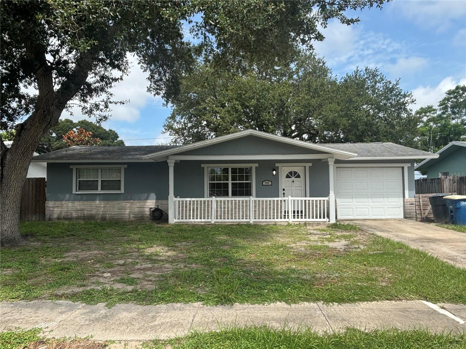 Welcome to the this move-in ready home in Live Oak Park. This 3 bedroom, 2 bathroom home features an oversized backyard with beautiful trees and space. Inside, you'll find nice tile floors, an accent wall in the living room that flows perfectly with the kitchen and dining room. The split floor plan features the primary bedroom and bathroom separate from the 2nd and 3rd bedrooms. The bathroom has been beautifully updated as well. Out back, there's a large covered screened in lanai that is great for entertaining. the backyard is a nice open space that has plenty of room for a pool. The roof is 2019.