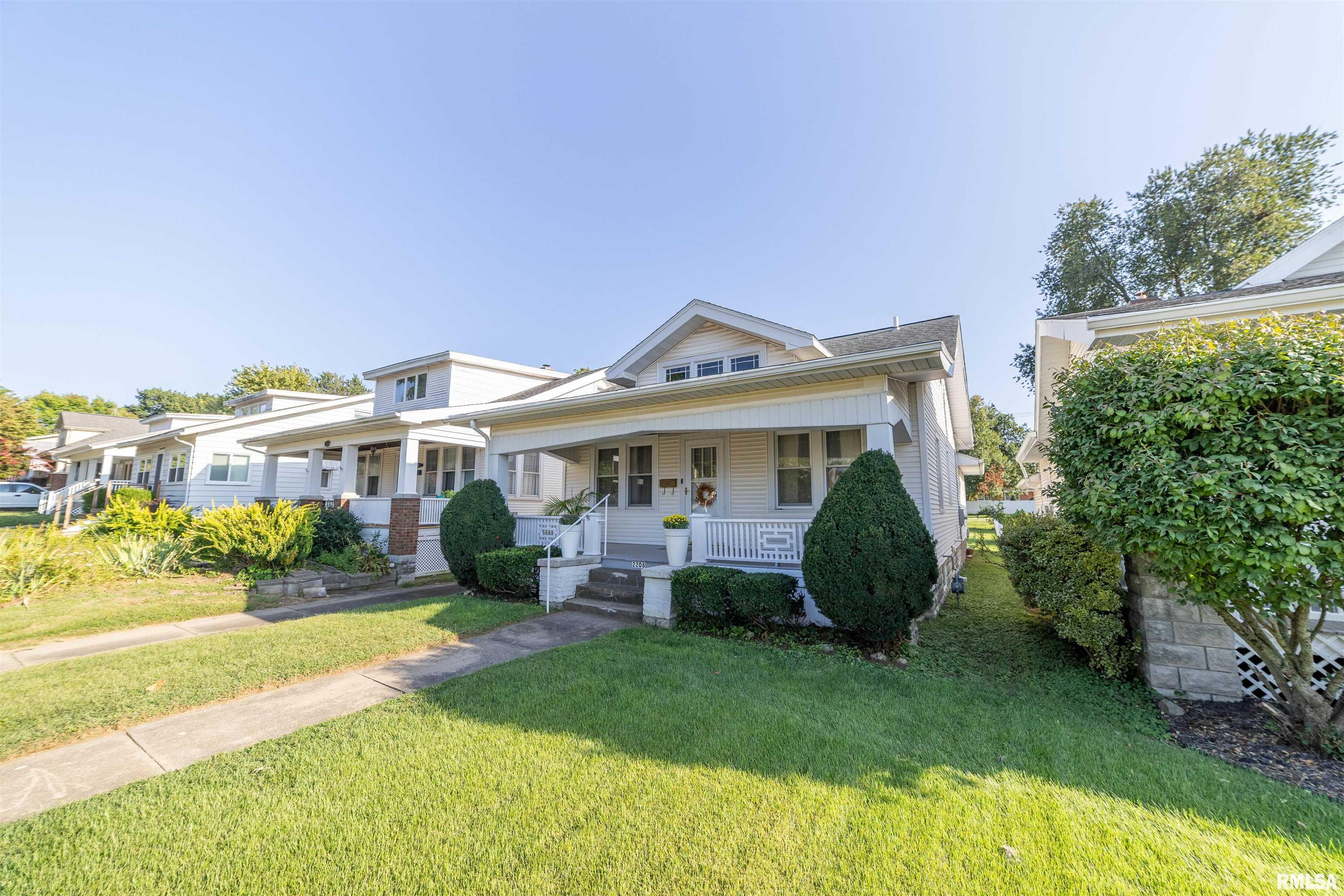 Well-maintained 2-bedroom bungalow offering classic charm, many updates and more living space than you might expect. A large family room addition provides an inviting second living area, while the bathroom features a steam shower. Enjoy the covered front porch and the convenience of a unique drive-through garage with access from both ends. Attic access is located in the 2nd bedroom closet. The basement offers additional potential with walls already studded and ready for drywall, providing an opportunity to create additional finished living space. With its spacious family room, updated features and functional floor plan, this Quincy bungalow offers a great combination of character, comfort and future potential.