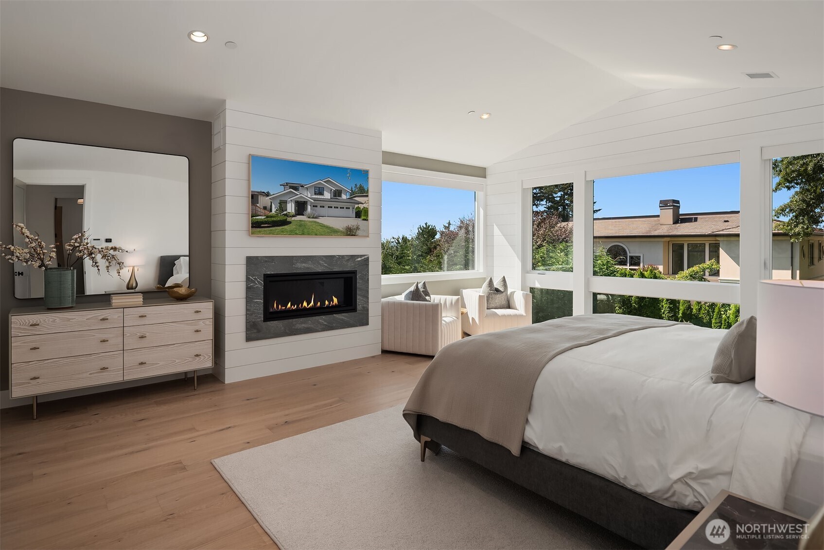Spa-inspired primary suite with fireplace.
