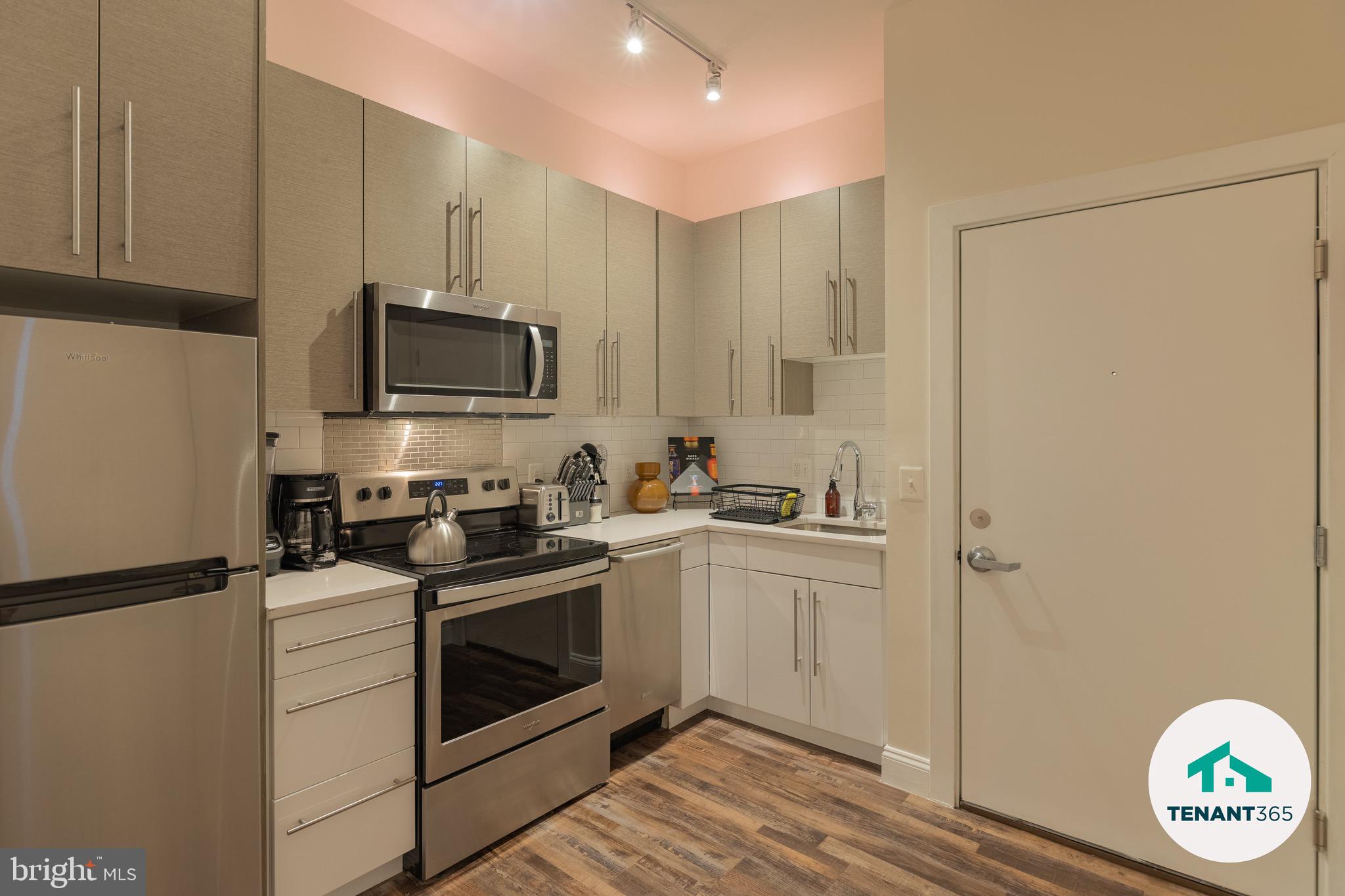 Experience the epitome of urban living in this stunning 1-bedroom apartment located in the heart of Downtown Baltimore. Recently renovated in 2022, this mid-rise gem boasts luxury vinyl plank flooring and high-end appliances, including a front-loading washer and dryer, refrigerator, and stove, ensuring both style and convenience. Enjoy breathtaking city views from your home, complemented by 24-hour security and a comprehensive security system for peace of mind. The lease includes essential amenities such as internet, security monitoring, trash removal, and discounted parking, all while being fully furnished for your comfort. With a minimum lease of 3 months and a maximum of 24, this exclusive residence is available starting March 2, 2026. Embrace a lifestyle of sophistication and ease in this beautifully appointed space, where every detail has been thoughtfully curated for your enjoyment. Don't miss the opportunity to call this luxurious apartment your home.