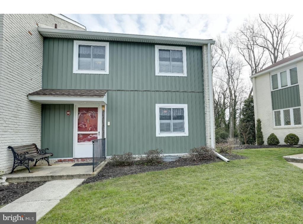 Welcome to 10 E Close in Moorestown Mews, offered at $389,900 — an exceptional opportunity in one of Moorestown’s most sought-after condo communities. With other current listings in the development priced higher, this home is competitively priced to create strong interest and offer real value for buyers looking for space, location, and potential. Lovingly maintained and in amazing condition, this light-filled townhome offers a rare chance to enjoy the largest floor plan in the community while adding your own modern updates over time. This 3-bedroom, 2.5-bath Colonial townhouse offers approximately 1,716 sq ft above grade plus a surprisingly spacious lower level, giving you 3 levels of living space and the kind of storage that is incredibly hard to find in condo living. While some finishes reflect a more classic style, the home has been lovingly cared for and offers a fantastic opportunity to personalize with neutral paint, updated carpeting or flooring, and modern furnishings. The layout, natural light, and location are what make this home truly special. The kitchen, updated in 2017, is a true highlight and was thoughtfully designed for real living, featuring loads of upgraded cabinetry in beautiful wood tones, stone countertops, a floor-to-ceiling pantry cabinet with custom pull-outs, and a dedicated coffee bar area. The kitchen is generously sized with room to add a trendy mobile island for even more prep and gathering space, making it ideal for one chef or even two. During the renovation, the wall between the kitchen and dining/living area was opened up with a peekaboo window and seated bar, creating a more connected, open feel that buyers love for everyday living and entertaining. Natural light pours into the home, and the townhome feels quiet, peaceful, and tucked away. From the living room, step right out onto the oversized private wood deck with a beautiful view of the park, creating a perfect extension of the living space for relaxing or entertaining. The lower level offers rare flexibility and exceptional storage with five separate rooms/areas, including a finished space currently used as a gym, a huge walk-in pantry/storage area, a laundry room, a utility room, and an additional storage room. If storage has been on your wish list, this home delivers in a way that is very hard to find in condo living. The second floor features an extra-large primary bedroom with beautiful natural light pouring in from the backyard side, along with a dressing area, two side-by-side closets, and a private primary bath with a walk-in shower. The two additional bedrooms are both nicely sized, and an oversized hallway closet provides even more practical storage. Moorestown Mews is a wonderfully small community of just 65 condos, known for its friendly neighbors, peaceful setting, and long-term residents, and homes here are rarely available. From your front door, you can stroll right out to Main Street to enjoy Moorestown’s restaurants, shopping, and beloved annual parades and festivals. Additional convenience includes one assigned parking spot right out front for easy access. This is a special chance to own a spacious, light-filled home in one of Moorestown’s most cherished condo communities, with an unbeatable location, an amazing kitchen, and a layout buyers can truly make their own. Note: hot water heater 12/2020, HVAC 2013 and roof 6 years old.