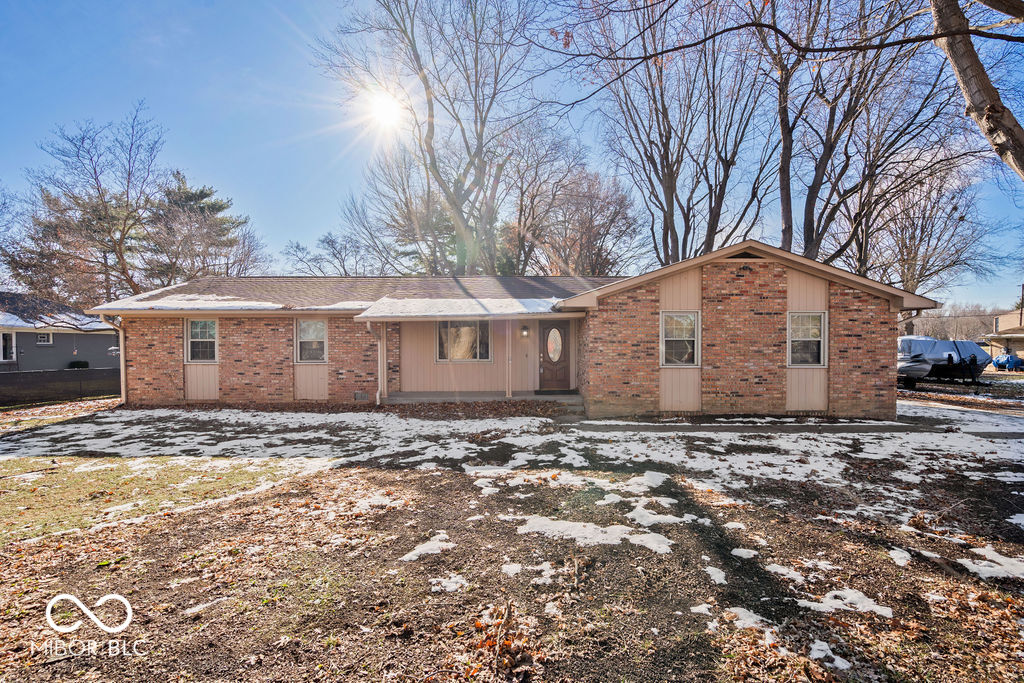 Charming 3-bedroom, 1.5-bath home in the heart of Carmel, just minutes from the vibrant Carmel City Center. This inviting property features two spacious living areas and a mix of hardwood and laminate flooring throughout. Enjoy a large, private backyard-ideal for gardening, entertaining, or quiet relaxation. Major updates completed in 2023 include a new furnace, AC, water heater, water softener, washer, and dryer for true peace of mind. The cozy fireplace was fully refurbished and comes with a transferable 25-year warranty. An added bonus: a heated and cooled shed (2022), perfect for hobbies, storage, or a small studio. Move-in ready and perfectly located-don't miss this one!