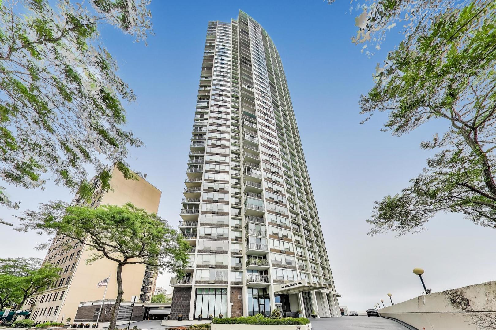 Experience breathtaking, unobstructed lake views from every room in this fully renovated and FULLY furnished 2-bedroom, 2-bathroom Edgewater condo. No detail was overlooked - this stunning home was completely gutted and upgraded with all new windows, air conditioners, heated floors, and designer finishes throughout. The modern kitchen boasts quartz countertops, a large island with extra storage and seating, and a GE Profile Smart 4-Door French-Door Refrigerator in fingerprint-resistant stainless steel - all with open views of the lake. The oversized primary suite features an en-suite bath with marble floors and walls, a relaxing soaker tub, a walk-in closet, and a linen closet. The east-facing layout floods the space with natural light and includes a newly renovated balcony enclosed with glass windows, creating a versatile three-season outdoor living area. For added convenience, enjoy an in-unit LG Smart Wi-Fi enabled washer and dryer. This boutique building offers only four units per floor and premium amenities including 24/7 door staff, a rooftop pool and sundeck, sauna, exercise room, and extra storage. Valet garage parking with weekly car washes is available for $140/month. Owner-occupant building with no special assessments. Prime A+ location with the CTA 147 express bus at Glenlake & Sheridan and the Red Line "L" just 0.4 miles away. Whole Foods, the Lakeshore path, Kathy Osterman Beach, plus trendy cafes, restaurants, shopping, and vibrant nightlife in Edgewater and Andersonville are all just blocks away. This turnkey lakefront residence is the epitome of refined modern luxury - don't miss it!