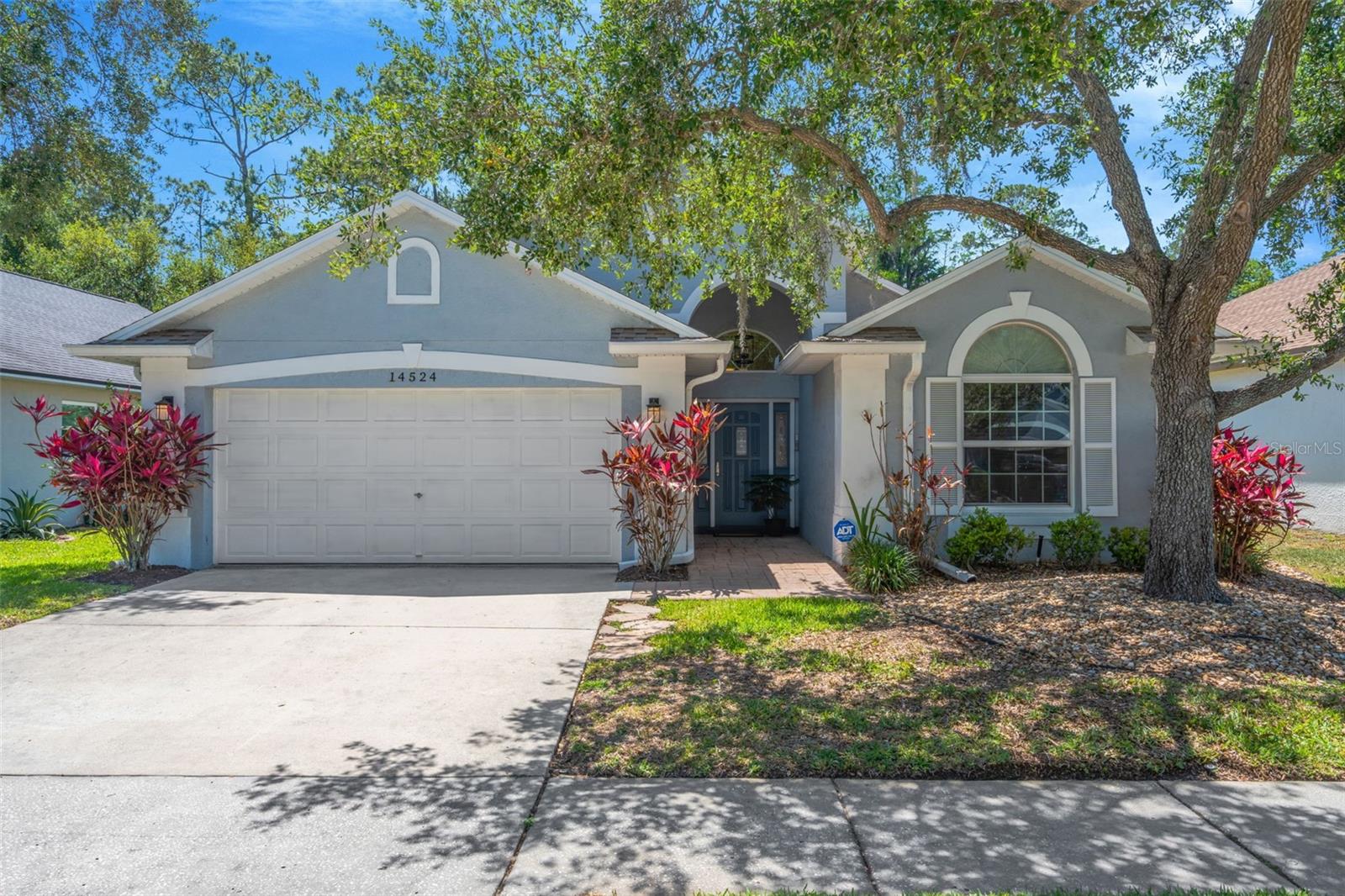Don't wait to see this stunner! This meticulously maintained pool home in Westwood Lakes checks all of the boxes. Privacy is not an issue here with a deep fenced lot and expansive wooded views. The backyard oasis is so peaceful and offers mature landscaping, a vinyl fence, a covered porch with a ceiling fan, and a screen-enclosed, solar-heated saltwater pool. The natural gas whole-house generator provides power for your HVAC, appliances, and electronics during storms or power outages. The interior is bright with tons of natural light and vaulted ceilings. There are sliding glass doors leading to the porch from the living room, the family room and the primary suite. And the windows and sliders are all equipped with electric privacy shades! The entertainer's kitchen is open with warm granite countertops, pendant lighting, a gas range, crisp white cabinetry and stainless steel appliances. The luxury vinyl plank flooring throughout creates a beautiful, smooth foundation to create your dream home. The split floor plan offers great options for a growing family or a multi-generational arrangement. Be sure to see the floor plan attached. Improvements include: *ROOF in 2019 *WATER HEATER in 2025 *REFRIGERATOR AND MICROWAVE in 2025 *WASHER AND DRYER in 2023 *The windows and glass sliders have been replaced since original construction and the floor of the 2-car garage has epoxy coating. Bring your pickiest buyers and prepare to be impressed!