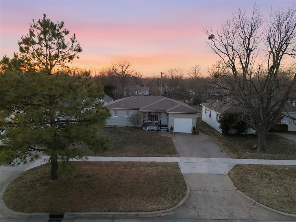 Charming mid-century home ideally located in the heart of Downtown Edmond. This charming 3-bedroom, 1-bath home offers timeless character, functional living space, and a one car garage, all set on a generously sized lot with a large backyard—a rare find in this highly sought-after area.The true highlight of this home is its unbeatable location. Just steps from Downtown Edmond, you’ll enjoy walkable access to 50+ local shops, cafe's, and restaurants, along with beloved community events such as the Edmond Arts Festival and Hurd on Hurd.