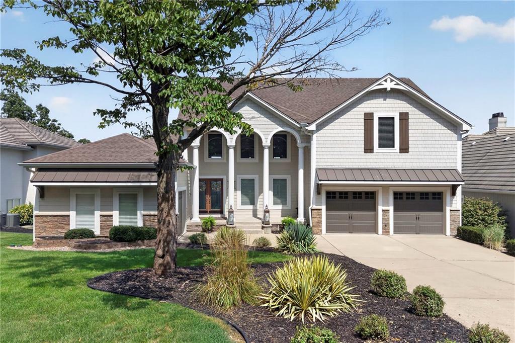 Welcome home to this Spectacular Lakefront Home with 6867 Gross Sq ft and Personal Dock located on the newly expanded lake at Lake Winnebago! Located on coveted South Shore Drive-this home location is unique in that it offers acres of Walking Trails in a Wooded Area just across the street and nearly no 2nd tier homes.  Curb Appeal is Excellent with a significant Remodel including: Newer Siding, Windows, Roof and Gutters.  Enjoy the gorgeous lake views year round from the floor to ceiling Soaring Windows! Walk outside to Breathtaking Views, and be within steps of your own Private Dock with Boat Lift; located on the Main Channel on Wide Body Water with great Depth! This 1.5 Story home with Finished Walkout basement offers a Huge amount of Living Space with Vaulted Ceilings and Endless Views.  An Open Concept Floorplan with the Kitchen opening up to the Great Room with gorgeous Stone Fireplace is perfect for entertaining. Also on the Main Level is the Primary Bedroom Retreat with Fireplace that has easy accessibility to the Laundry Room off the spacious closet. The Lower level is an Entertainment Mecca with a spacious Family Room, Bar, and Billiards Area.  You will find 2 Bedrooms and a Large Shared Bathroom on this level. The Upper Level offers a Loft Area, Bedroom and/or Office and Full Bath.Come enjoy all Lake Winnebago has to offer...whether it's boating, skiing, wakeboarding, sailing, fishing, listening to live music and dining at the Yacht Club, walking paths, nature trails, equestrian facilities, tennis/pickelball, or swimming at the new community pool. Lake Winnebago has it all!