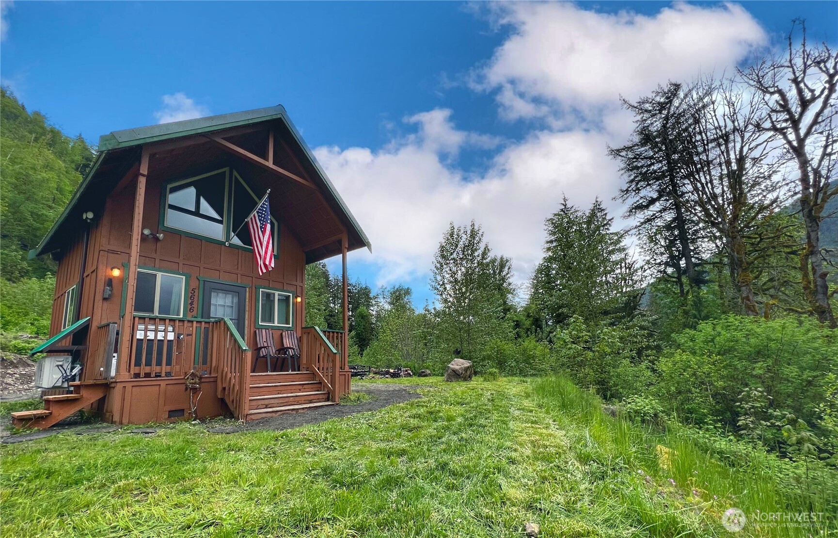 Income-producing Fully-furnished Cabin with View of the Tilton River on 11.74 acres! Cabin lined top to bottom in knotty pine, Kitchenette with fridge, hot plate, toaster oven & Keurig. Loft-style sleeping area with breathtaking view of the river. Two BBQ's, RV hookup, wood fire pit, and scenic view from your hot tub for two. Current Airbnb averages $42,000 per year for a 7.4% cap rate! Private gated entrance: shares well water with adjoining parcel and previously shared power. Adjacent parcel and cabin listed together at NWMLS # 2341643. Countless possibilities for campers, RV's, and/or additional cabins. Check with Lewis County building department for your specific ideas. Seasonal Waterfalls, wildlife abundant.