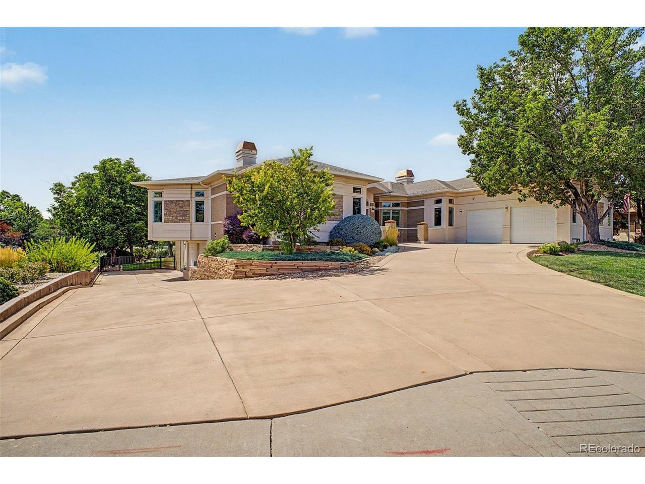 A remarkable setting where architecture, water, and landscape come together. Positioned on an exceptional corner lot, 57 Blue Heron Drive is bordered by water on two sides and adjoins maintained open space, creating a rare sense of openness. Mountain views rise beyond the water, while fishing and boating access invite you to experience the setting.Inside, more than 100 windows fill the home with natural light, framing water, mountain, and open-space views throughout. The chef's kitchen sits at the heart of the residence with generous cabinetry, expansive preparation space, a center island, and a stunning breakfast nook designed around the view. Morning coffee comes with a front-row seat to the water.Thoughtfully designed for entertaining and everyday living, the home offers 4 bedrooms, 6 bathrooms, two distinct living spaces, and a beautifully appointed dining room near the entry. A richly detailed wood-paneled office brings timeless character, while an art studio and private workout/flex room adjoining the primary suite add versatility.The primary suite feels like a retreat of its own, complemented by a spacious bath and abundant natural light. Throughout the home, soaring ceilings, expansive windows, architectural details, and generous proportions create an atmosphere that feels substantial yet inviting.Outside, a sprawling deck and expansive covered lower patio provide exceptional spaces for dining, entertaining, or enjoying the landscape. With water wrapping two sides of the property, the outdoor spaces feel remarkably connected to their setting.Additional highlights include a heated driveway, lower-level garage with dedicated workshop space, extensive storage, and flexible spaces throughout.Few properties offer this combination of water, open space, mountain views, natural light, and architectural presence. 57 Blue Heron Drive is defined by its setting, with the surrounding landscape woven into nearly every room.