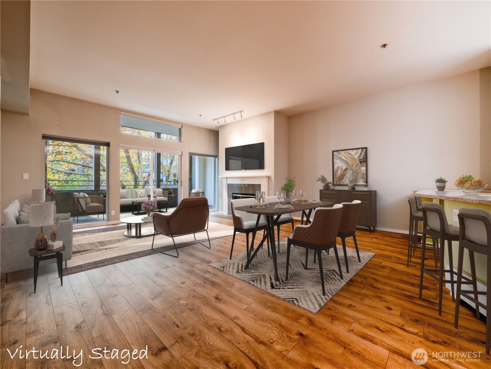 Experience urban living in this spacious, updated condo at The Florentine, a thoughtfully renovated building in Seattle's historic Pioneer Square neighborhood. The open-concept floor plan features soaring ceilings, durable LVP flooring, and expansive windows that fill the home with natural light. A large kitchen with stainless steel appliances, abundant counters and soft-close cabinetry provides excellent storage and functionality for everyday living and entertaining. Relax by the wood-burning fireplace or step onto the east-facing balcony, offering a comfortable outdoor space to enjoy throughout the year. The versatile den/office provides flexibility for a home office, guest space, hobby area, or potential 2nd bedroom. Ideally located near Lumen Field, T-Mobile Park, King Street Station, dining, shopping, arts venues, and neighborhood amenities, this home offers convenient access to transportation and entertainment options. Additional highlights include in-unit laundry, low HOA dues, secure garage parking, dedicated storage, and onsite management. Don’t miss this opportunity to enjoy a well-appointed condo in one of Seattle's most vibrant and connected neighborhoods!