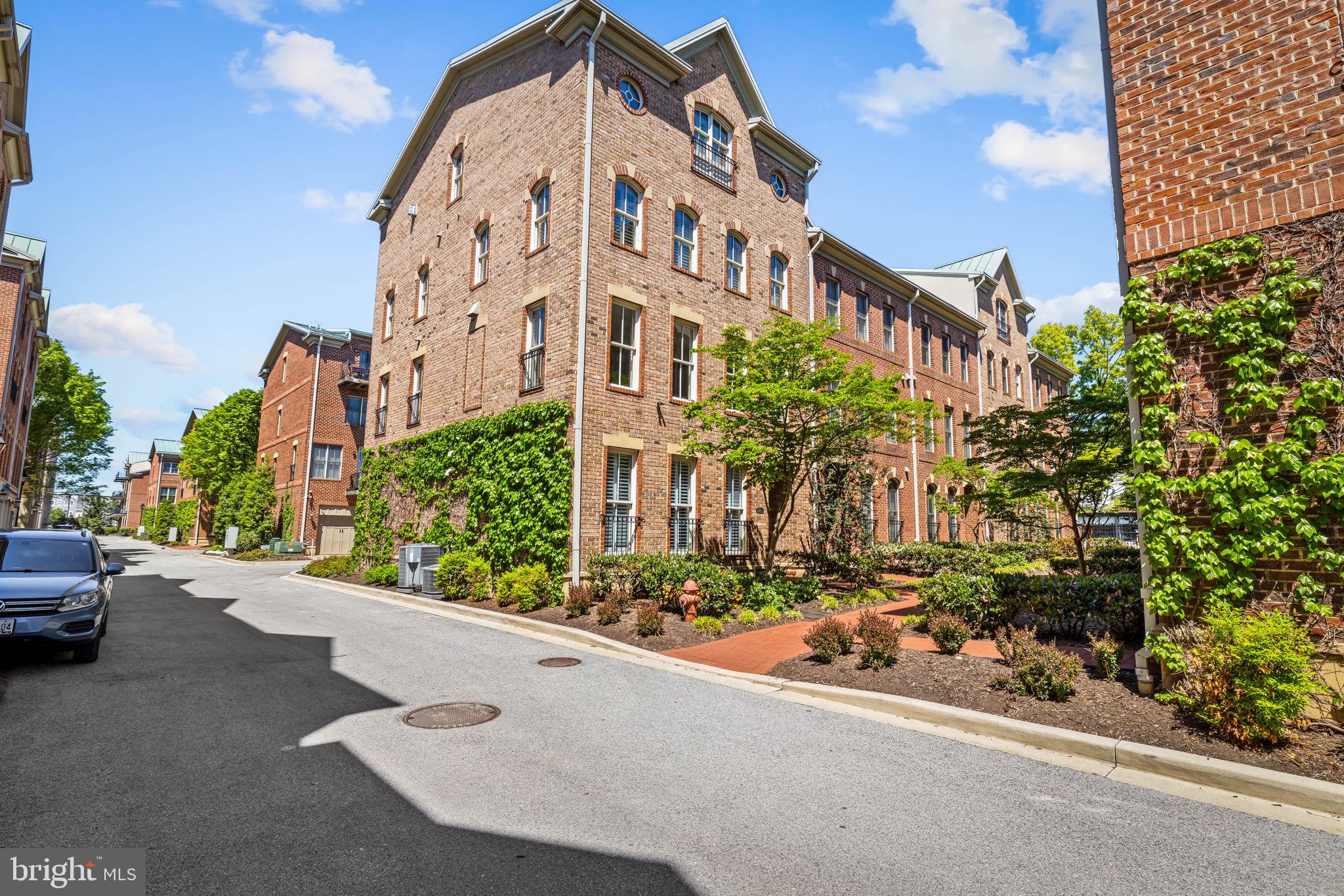 Check out the virtual tour! Step into this beautifully appointed end-of-row townhouse offering 3 bedrooms and 4.5 bathrooms in the highly desirable North Shore community. As the largest model available, this home delivers exceptional space and comfort, enhanced by an abundance of natural light streaming through oversized windows throughout.The entry level welcomes you with a full bath and a convenient wet bar—perfect for entertaining, hosting guests, or creating a flexible bonus living area. Upstairs, the main level showcases a fully open floor plan featuring a seamless flow between the kitchen, living room, and dining area, creating an ideal space for both everyday living and gatherings. The kitchen stands out with high-end appliances, generous counter space, and a layout designed for effortless entertaining.The top-floor primary suite offers a private retreat with a beautifully updated bathroom, complete with a walk-in shower, soaking tub, and a spacious walk-in closet. Two additional bedrooms, along with a dedicated office, provide plenty of flexibility for family, guests, or working from home.A two-car garage with interior access adds everyday convenience, along with additional storage space.Spacious, light-filled, and thoughtfully designed, this is truly a spectacular property offering the perfect blend of modern living and prime location—an opportunity you won’t want to miss.