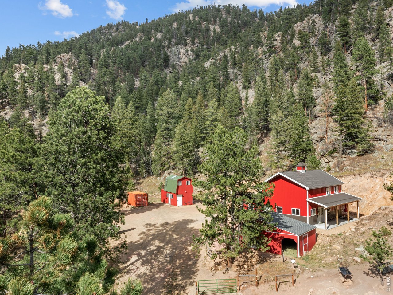 Your mountain getaway awaits at this special property on 7+-acres bordering National Forest! Main home was created in 2023, with an open concept floorplan, main level bedroom & bath, plus versatile loft for your theatre room or hobbies; 2nd bedroom/office is great flex-space for company or an ideal home office space. 32' covered patio makes for enjoyable outdoor space and gatherings. There are also 2-attached stalls for your horses or pets, which could also be finished into more living space or a 2-bay garage. This house sits on 4.56 acres which includes a shed/tack/hay storage, loafing sheds and approx. 1.5/acres of fenced/cross fenced corral for horses. The guest Cabin sits on the adjacent 2.46-acres and features all the comforts of home, with open great room, 3/4 bath, loft bedroom and an upper deck that overlooks the peaceful forest. A special opportunity for a 7-acre family compound in Estes Park, perfect for the getaway weekends or simplified fulltime living. $799,000!