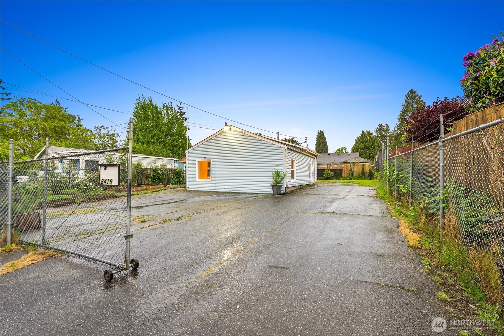 Unique Live/Work Loft Opportunity with Dual-Lot Versatility!  Welcome to this incredible 1,630 sq. ft. open-concept, loft-style home offering unmatched flexibility for urban living, a home business, or multi-generational arrangements. Situated on two legally separated lots(118000-2164-08 and 118000-2165-07), this unique property features two distinct living spaces and three separate entrances, easily configuring into a 3-bedroom layout.  Interior Highlights:  Modern Loft Aesthetic: Enjoy soaring high ceilings anchored by a bright skylight that floods the open-concept space with natural light.  Turnkey Kitchen: A brand-new, beautifully remodeled kitchen ready for entertaining.  Comfort & Convenience: Equipped with crisp A/C, two 3/4 bathrooms, and eco-friendly, low-maintenance flooring throughout.  Pet-Friendly Perks: A dedicated 90 sq. ft. mudroom complete with a built-in pet entrance.  Exterior & Grounds: Fully enclosed by secure fencing and lockable gate, the expansive grounds offer a safe haven for pets, a thriving vegetable and flower garden, and ample secured parking for your cars, boat, or RV.  The Location: Commuters will love the ultra-convenient location near the Renton Boeing plant with seamless access to public transit.  7 Minutes to The Landing’s premier shopping and dining.  7 Minutes to both I-5 and I-405.  10 Minutes to SeaTac International Airport.