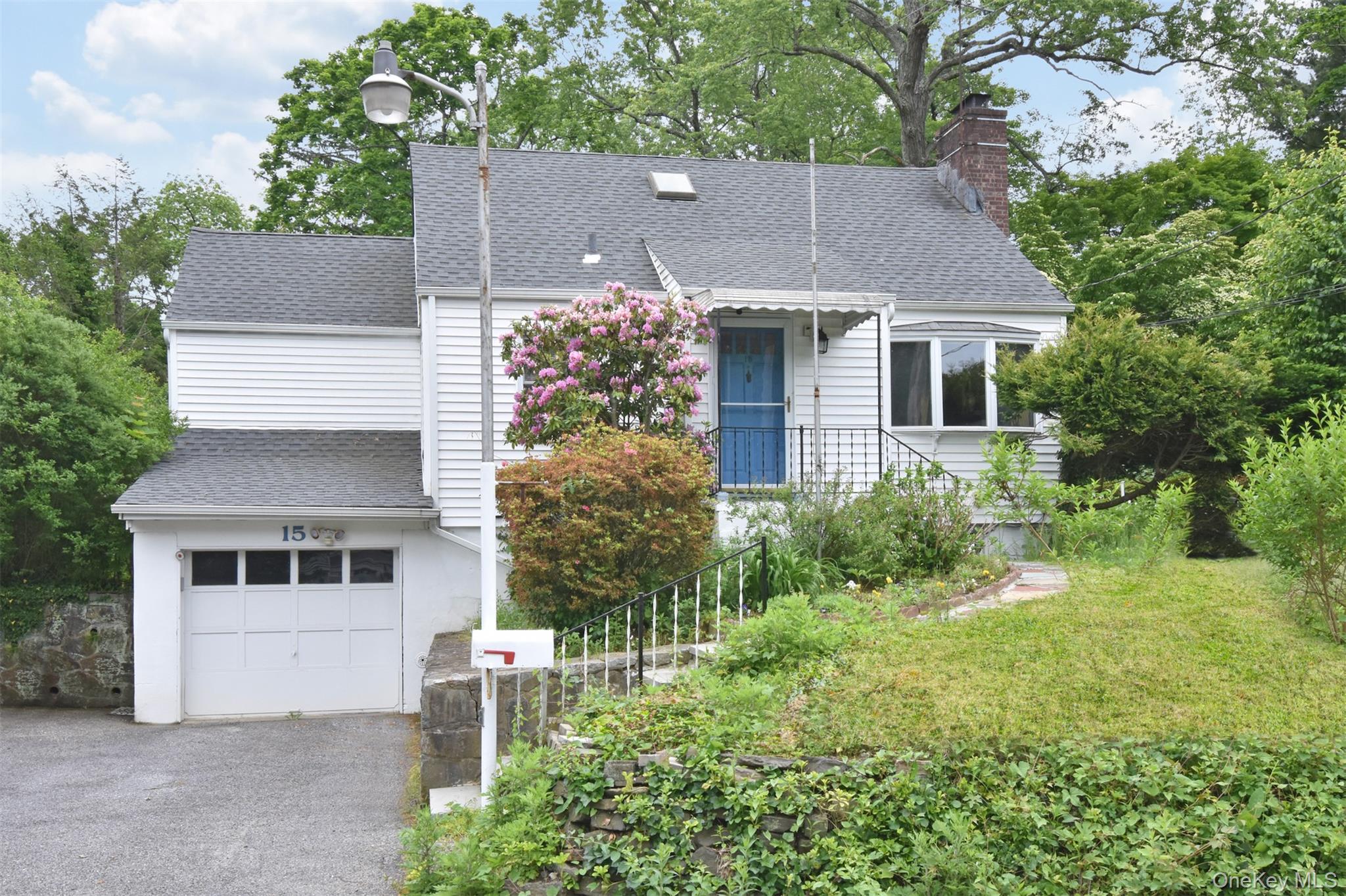 Award winning Ardsley School District. This charming home is located in a serene and quiet neighborhood. Walking distance to schools and parks. Wonderful windows allow natural light to flow in. Specials features include a wood burning fireplace, perfect to cozy up to on those winter nights. Off of the Living room/dining room is a large sunroom that is versatile with endless possibilities. The primary bedroom with an en suite and skylight. 2 additional bedrooms and a large hall bath. The back yard is private with a patio and room to play. 1 car garage. Roof 2021, Furnace 2018! Come to the wonderful town of Ardsley with great shopping and restaurants.