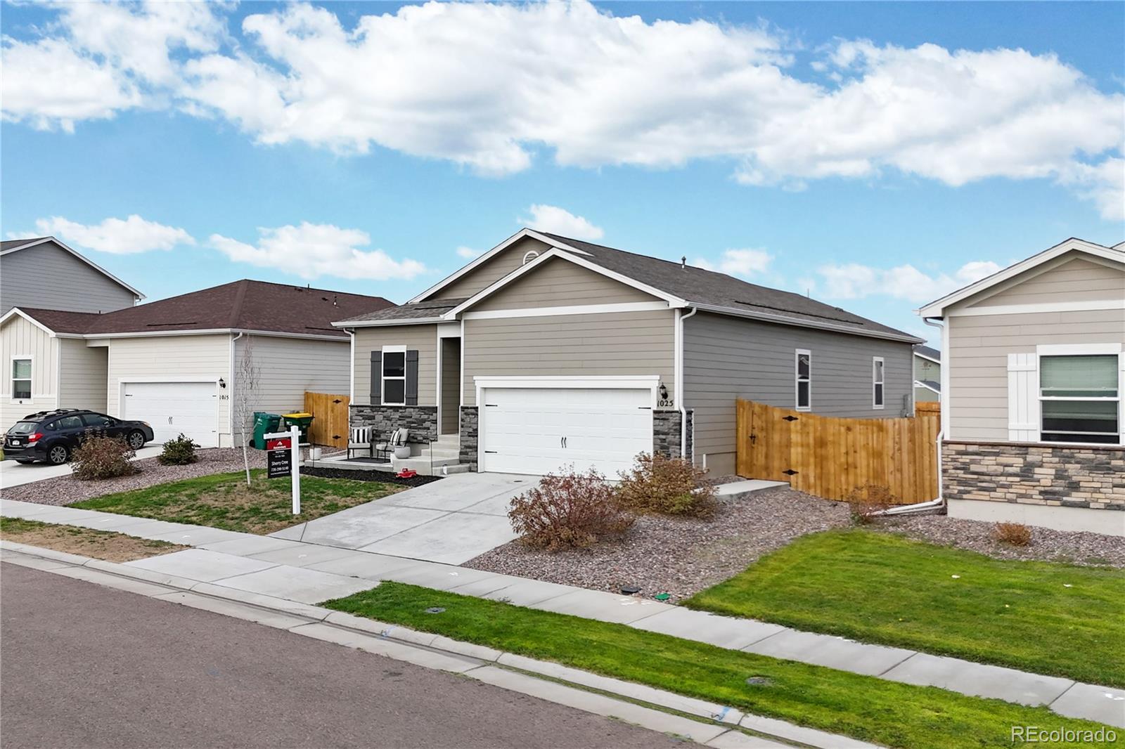 Welcome home to the Cottonwood Greens! This immaculate ranch style home (Arapahoe Model) is priced aggressively lower than inventory homes by the builder! Better than new for 3 reasons. 1. Gorgeous LVP flooring is extended throughout the home. 2. A specious concrete patio in the west-facing backyard creating an outdoor living space for BBQ’s and entertaining. Although the backyard is missing green grass, it is spacious! It would be perfect for a trampoline or playground structure. Or above-ground pool would be a great idea for the hot summer days. Also a front concrete patio is added. 3. Privacy tint is applied to the windows while abundance of natural light is filling the home. Formal dining room in the front of the house could be used as a living room or office. Kitchen opens to both the dining room and the family room. Kitchen features white cabinetry, granite countertops, stainless steel appliances and sink, built-in microwave, gas cooktop and oven, refrigerator, and a pantry for additional storage. Primary bedroom features an en-suite full bathroom and a walk-in closet.