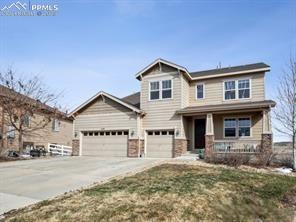 Tucked away at the end of a quiet cul-de-sac and backing to open space, this exceptional two story home with a finished walk-out basement offers the perfect blend of location, function, and style. From the moment you step onto the inviting front porch and enter the grand foyer with soaring 9ft ceilings and gleaming hardwood floors, you’ll feel right at home. To the right, a formal dining room sets the stage for gatherings complete with a butler’s pantry with beverage fridge and walk-in pantry. A chef’s kitchen features a granite island, stainless steel appliances including a built-in refrigerator, gas cooktop, and double ovens plus a stylish tile backsplash. The breakfast nook showcases peaceful views of surrounding trails and open space, while the adjacent great room with a cozy gas fireplace and statement feature wall is perfect for relaxing and entertaining. Toward the back of the home a private study with French doors offers a quiet retreat with stunning views along with a powder bath, and large laundry with sink. Upstairs, you'll find a generous loft, an additional readying or study nook , and a thoughtfully designed layout separating the primary suite from the secondary bedrooms. 
 The primary suite includes a walk-in closet and four-piece bath. One of the secondary bedroom has its own en suite bath, while the other two share a full guest bath. The finished walk-out basement is a standout feature, fully permitted through the city of Castle Rock as an ADU (Accessory Dwelling Unit) full multi generational living. This bright and airy space includes a living room, kitchen, dining area, bedroom with walk-in closet, full bath, and two storage rooms—ideal for multigenerational living or income potential. All finished with durable LVP flooring and sweeping views of open space beyond. Located in the desirable Carriage Hills section of Crystal Valley Ranch, the home is close to community amenities and trails.