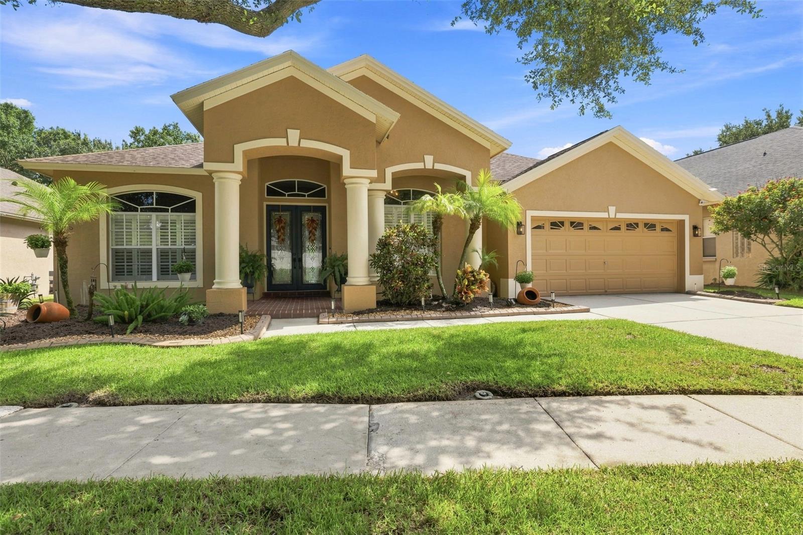 Under contract-accepting backup offers. Welcome home to a beautifully loved and thoughtfully maintained home tucked inside the desirable gated community of Villa Rosa. A home that has been cared for, enjoyed, and filled with memories, and is now ready for its next chapter. From the moment you arrive, there is an undeniable sense of warmth and pride of ownership. This is more than simply a house; it is the kind of place where everyday moments become some of life’s favorite memories. Designed with comfortable Florida living in mind, the floor plan offers welcoming living spaces, generously sized bedrooms, and an easy flow that works beautifully for both everyday family life and entertaining. Whether everyone is gathering together or looking for a quiet space of their own, the home provides the flexibility as life changes and grows. The bedrooms offer comfortable retreats at the end of the day, with laminate flooring added in 2022 and the bedrooms painted in 2025, creating a fresh, move-in-ready feel. Plantation-style blinds were added to the front of the home in 2025, bringing timeless character and a polished finishing touch. Step outside and discover a private Florida retreat designed to be enjoyed year-round. The outdoor living and pool area is the perfect backdrop for the moments you will remember most. Saturday afternoons swimming in the pool, cookouts, birthday parties, friends gathered for dinner, or simply enjoying a peaceful morning outside with a cup of coffee. A new PVC fence installed in 2026 adds privacy to the backyard, while a new pool pump in 2025 and Barracuda pool vacuum in 2024 help make caring for the pool easier so there is more time to simply enjoy it. This home has been continually cared for with thoughtful improvements throughout the years. Additional updates include an HVAC system installed in 2020, exterior paint completed in 2024, and a Ring whole-house security system added in 2025 that conveys with the home. Each improvement reflects the attention and care that has gone into maintaining the property and preparing it for who will call it home next. Beyond the home itself, Villa Rosa offers the added comfort and privacy of a gated community, sought after Steinbrenner school district, while keeping you conveniently connected to everything the Tampa Bay area has to offer. Shopping, dining, recreation, and major roadways are all within easy reach. This is a home where there is room to grow, gather, celebrate, relax, and create traditions of your own. Welcome Home and don’t forget to click on the virtual tour!