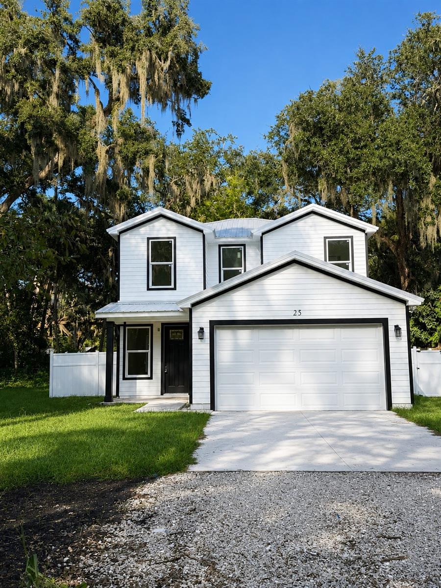Brand-New Construction Near the Intracoastal and situated on a beautiful homesite in the highly sought-after Hammock area, surrounded by stately oaks, mature foliage, and the timeless charm of Old Florida. Enjoy a peaceful, tucked-away setting while still being just minutes from A1A, I-95, Publix, local restaurants, and the beach.  This beautifully designed brand-new construction offering modern comfort, coastal style, and an unbeatable location just one block from the Intracoastal Waterway. This two-story home features 3 bedrooms, 2 baths, and a thoughtfully designed layout with all bedrooms conveniently located upstairs.  Step inside to a bright, open-concept living space featuring durable LVP flooring throughout and a seamless flow between the living room, dining area, and kitchen. The stunning kitchen is the heart of the home, offering crisp white cabinetry, beautiful quartz countertops, abundant counter space, a spacious island with additional seating, and a charming breakfast nook—perfect for casual mornings or entertaining guests.  Large windows fill the home with natural light while offering views of the beautifully landscaped surroundings. Upstairs, the three bedrooms provide comfortable private retreats, with the primary suite offering a peaceful place to unwind after a day spent enjoying everything the area has to offer.  Step outside to the private backyard, where you'll find plenty of room to relax, entertain, or create your own outdoor oasis. The fenced setting provides an added sense of privacy and complements the home's fresh, coastal-inspired exterior.  Located just one block from the Intracoastal Waterway, this home puts you close to boating, fishing, kayaking, scenic waterfront views, and the laid-back Florida lifestyle. Brand-new construction, stylish finishes, a private backyard, and an exceptional location come together to make this a home you'll want to see in person.  The property is ideally located between St. Augustine and Daytona Beach, with both approximately 20 miles away. Nearby access to the Intracoastal Waterway can be found at 17th, 18th, and 20th Streets, including convenient boat access for fishing, kayaking, and enjoying the waterfront. Bing’s Landing is also just a short drive away with a public boat ramp, park, and Intracoastal access.  A great opportunity to build in one of Flagler County’s most desirable coastal communities, offering the perfect combination of privacy, natural beauty, and convenience.
