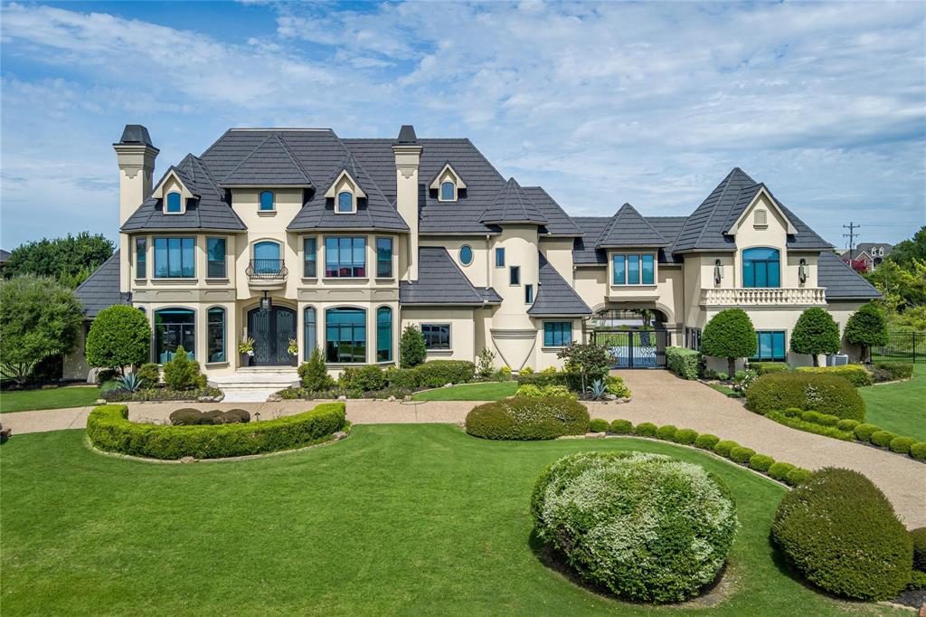 Nestled in the prestigious and highly sought-after Whispering Farms community, this extraordinary estate offers unrivaled luxury and sophistication. Located within the top-rated Prosper ISD, this magnificent 5-bedroom, 10-bathroom residence spans a sprawling 2.279 acres, providing an exclusive oasis of privacy and elegance that’s unlike anything else.Upon entering, you are immediately enveloped in an atmosphere of refined grandeur. The expansive floor plan features world-class finishes and unparalleled attention to detail. The grand formal living room, with its soaring ceilings and elegant design, is the epitome of luxury and the perfect space for hosting sophisticated gatherings. A dedicated office provides an impeccably serene environment for productivity, while the private media room offers an immersive cinematic experience like no other. The stunning study area is the ultimate sanctuary for quiet contemplation and inspiration.The outdoor space is nothing short of breathtaking. A resort-style pool with a sport pool feature is a sanctuary for relaxation and active enjoyment alike. The meticulously designed outdoor area also includes a state-of-the-art full-sized basketball court and a batting cage, providing a world-class setting for endless entertainment and recreation.No detail has been overlooked in this home, with two luxurious mother-in-law suites offering complete privacy and comfort for guests. For those seeking the ultimate retreat, the expansive man cave is a sophisticated space for both relaxation and entertainment, perfect for unwinding in style.
Safety and comfort are paramount, with a highly secure 12-person storm shelter ensuring peace of mind during inclement weather. Fitness enthusiasts will appreciate the cutting-edge gym, designed to make staying active an effortless and indulgent experience.
This estate is a true testament to the pinnacle of refined living, blending exquisite luxury, complete privacy, and functional elegance.
Showing By APPT.