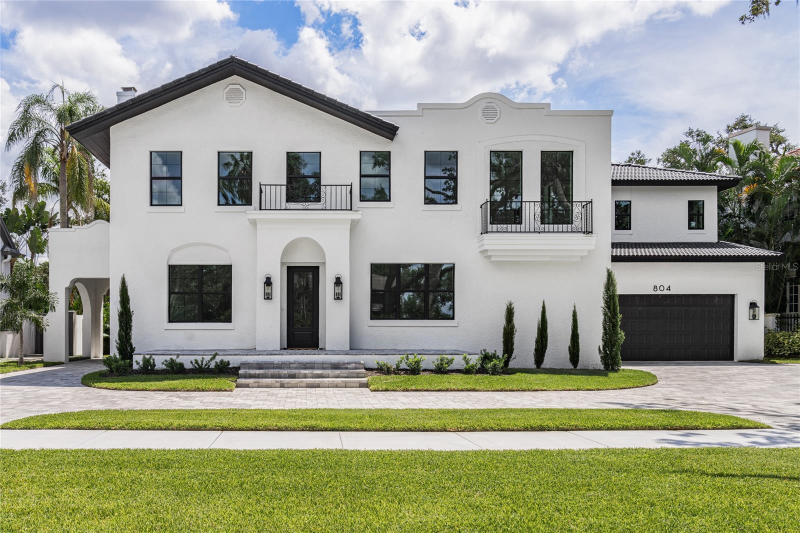 Step into a piece of Tampa history with this stunning original Beach Park Mediterranean estate, impeccably restored between 2023 and 2025 to fuse timeless charm with contemporary sophistication. This grand residence spans an expansive 6,398 square feet and boasts 7 spacious bedrooms, 9 exquisitely designed bathrooms, and a wealth of living spaces crafted for both daily comfort and lavish entertaining.  

The interior captivates with wide-plank white oak flooring flowing seamlessly throughout, complemented by custom white oak cabinetry and paneled appliances in the gourmet kitchen, where a hidden pantry adds a touch of sleek functionality.

Entertain in style with two elegant dining rooms, a cozy den with its own wood burning fireplace, and a sprawling living room awash in natural light with a gas burning fireplace. For the wine enthusiast, a custom wine closet provides the perfect haven to store and showcase your collection.

The first-floor primary suite offers a serene retreat with its own luxurious en-suite bath, find yourself greeted from head to toe by honed iceberg marble. While the second floor boasts an additional primary/guest suite, equally impressive with ample space for visitors or multi-generational living. Every one of the 7 bedrooms enjoys the luxury of a private en-suite bathroom, ensuring comfort and privacy for all. Organization meets opulence with California Closet systems installed in the bedroom closets, offering tailored storage solutions that maximize space and luxury. Convenience shines with laundry rooms thoughtfully placed on both floors of the home.

Outside, a 2-car garage and single-car covered porte-cochère meet the circular roman paver driveway, adding practicality and a touch of grandeur. Located in one of the most established and coveted streets in Beach Park, don't miss your chance to live in this amazing neighborhood where you can walk the tree-lined streets and take in the pleasant waterfront views. This home is just moments from Tampa’s premier dining, shopping, and cultural destinations- also zoned for South Tampa's A-Rated school districts.

A rare chance to own a fully restored historic masterpiece with every modern indulgence—schedule your private tour today!