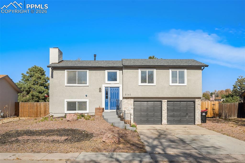 This beautifully updated home blends contemporary style with everyday comfort in one of Briargate’s most desirable neighborhoods. A large fenced backyard allows for pets and children to play with safety. A new roof has been added (2025) and an almost new hot water heater (2024). Laminate and carpet flooring throughout the house is new (2025) as well as a new microwave and dishwasher.  Downstairs bathroom tub is jetted, perfect for relaxing water therapy.  Lots of updates and upgrades have been done in this home and there are some projects you can do to make it yours! The modern stucco-and-stone exterior gives great curb appeal, complemented by a low-maintenance xeriscaped front yard and extra parkingbeside the driveway, perfect for guests, trailers, or a third vehicle. Step inside to discover a sleek modern stair railing, and a spacious vaulted living room with a cozy fireplace insert that’s ideal for relaxing or entertaining. The kitchen and dining area features contemporary two-tone cabinetry, granite countertops, tile backsplash, and stainless-steel appliances. Enjoy easy access to the deck for grilling or soaking up the Colorado sunshine. The primary suite offers a private retreat with an attached full bathroom, a large walk-in closet, and access to a second deck through the closet, a unique outdoor escape. A second upper-level bedroom completes the upstairs living area. The lower level offers exceptional flexibility with a large, light-filled garden-level family room and a nearby ¾ bath, perfect for a guest suite, rec room, or home office. Set in the heart of Briargate near top-rated District 20schools, local parks, trails, and everyday conveniences—this home truly combines location, livability, and lasting value!