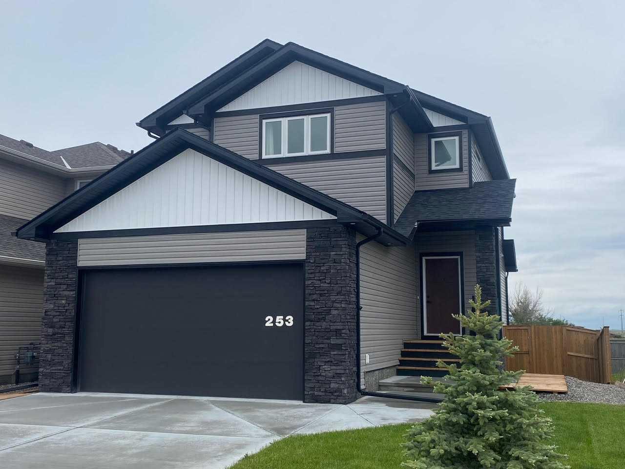 This exceptionally well cared for, stylish two-storey home offers the perfect blend of modern design and everyday functionality. With 1,738 sq. ft. above grade, the bright, open-concept main floor creates an inviting space where the kitchen naturally becomes the heart of the home. Featuring quartz countertops, stainless steel appliances, a generous pantry, and an oversized island perfect for gathering, it’s a space designed for both busy mornings and relaxed evenings.  Upstairs you’ll find a versatile bonus room that adds valuable living space—ideal for a family room, play area, or home office—along with three comfortable bedrooms, including a spacious primary retreat complete with a luxurious five-piece ensuite that offers a welcome escape at the end of the day. An additional fourth bedroom in the fully developed basement provides flexibility for guests, a home office, or growing families. Central air conditioning keeps the home comfortable throughout the summer, while the thoughtfully designed floor plan offers a seamless flow that’s equally suited to entertaining or everyday living. Outside, the low-maintenance yard lets you spend less time on upkeep and more time enjoying your home.  Still feeling fresh and modern, this home offers the appeal of new construction without the wait—move in and simply start enjoying everything it has to offer.