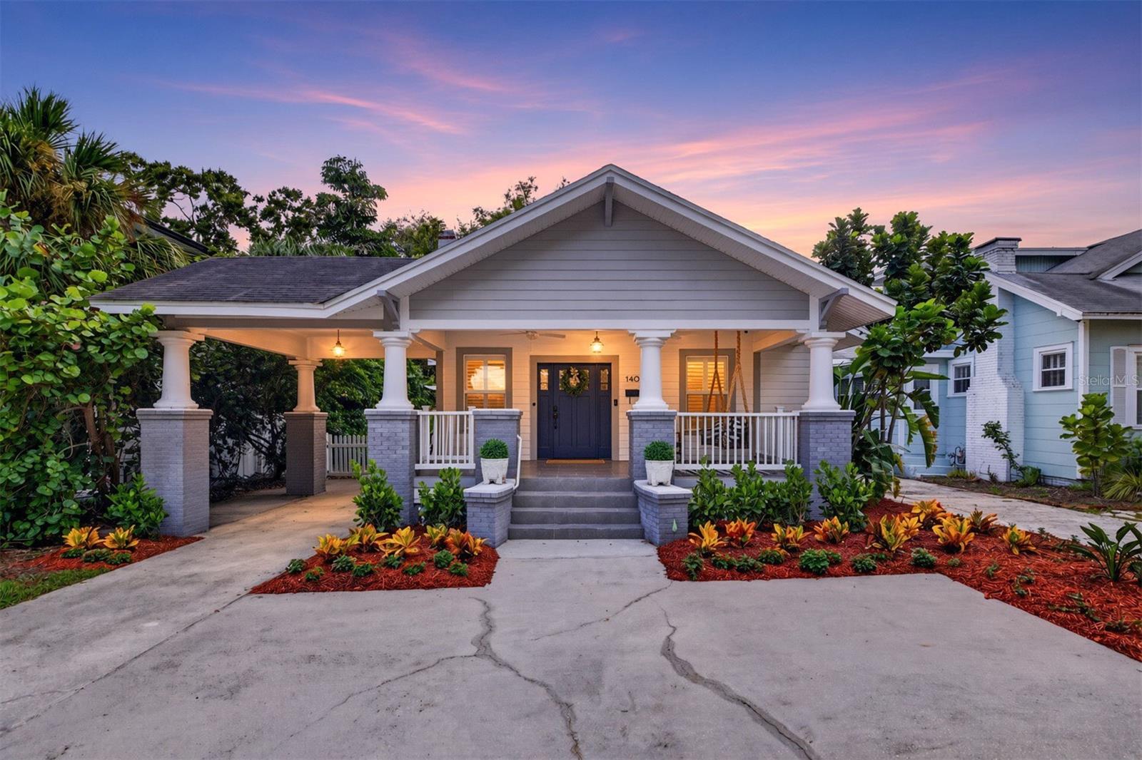 Welcome to 1407 S Moody, a beautifully remodeled South Tampa bungalow in an unbeatable location. Just off Bayshore Boulevard, you're within walking distance of Hyde Park Village and SoHo, with the area's best dining, boutique shopping, farmers markets, and scenic waterfront strolls right at your doorstep.  Inside, this 3-bedroom, 2-bath residence feels bright and open, with abundant windows filling the home with natural light. Gather by the fireplace in the inviting living room and enjoy a split floor plan that keeps the bedrooms private. Updated finishes include tile and wood flooring throughout the main living areas. The charming dining nook flows seamlessly to a spacious back deck, creating the perfect setting for morning coffee, outdoor entertaining, or relaxing evenings. Beyond the deck, enjoy a private backyard retreat surrounded by lush landscaping, offering a peaceful, tucked-away feel in the heart of South Tampa. Adding even more versatility is a detached space, ideal as a home office or guest suite. Complete with its own full bathroom and kitchenette, this separate area is a standout feature that offers endless possibilities for today’s lifestyle.  No flood insurance required, making this South Tampa gem even more appealing. With historic charm, thoughtful updates, and an exceptional South Tampa location, this home truly has so much to offer. Zoned for the highly sought-after Mitchell, Wilson, and Plant schools, you’re just steps from Bayshore and minutes from everything that makes South Tampa such a special place to call home.