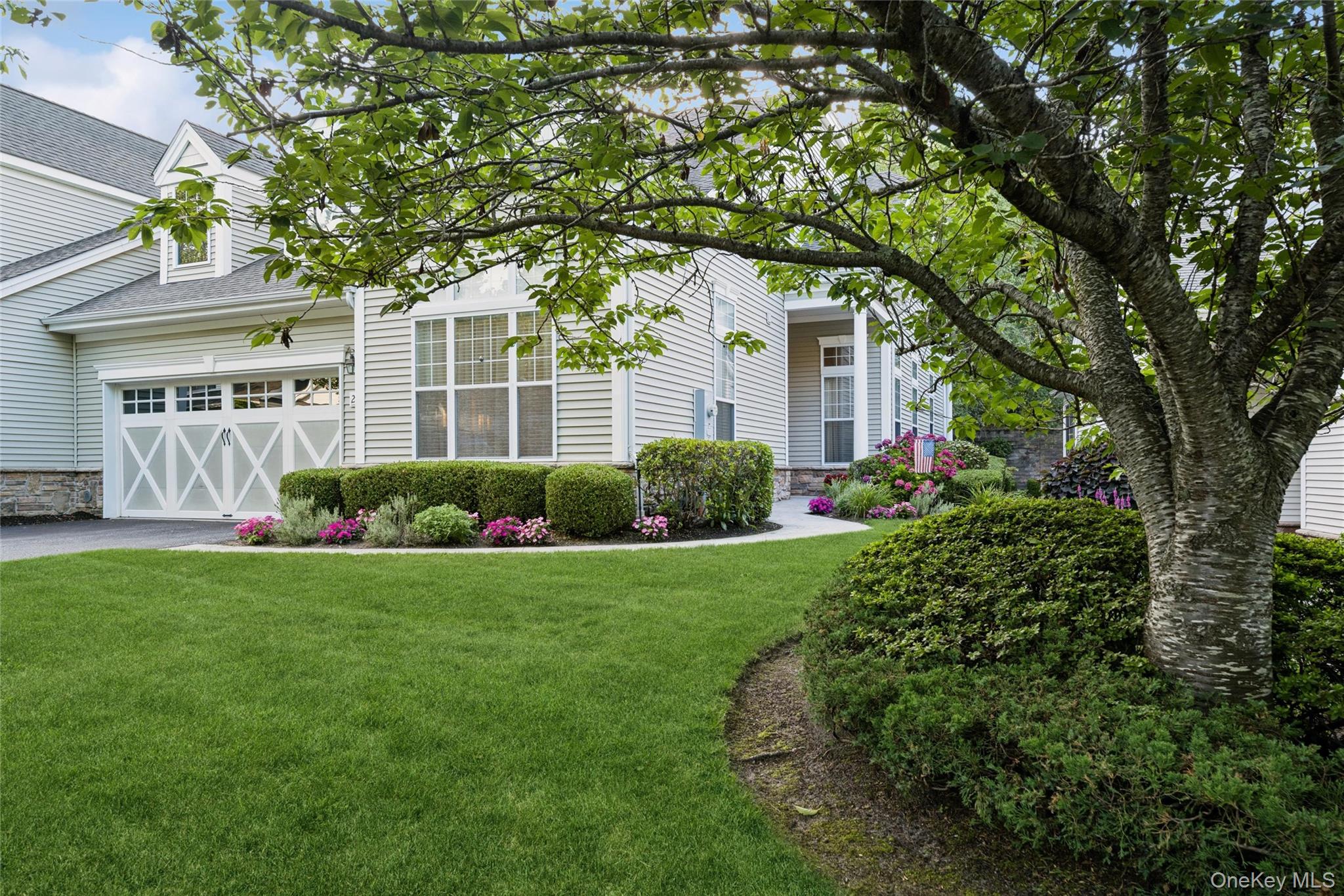 Welcome to this beautifully appointed Tempo Model, nestled within Encore Atlantic Shores a desirable 55+ gated community offering resort-style living. This thoughtfully designed home features a spacious primary bedroom suite, an inviting living room, formal dining room, and eat in kitchen complete with stainless appliances and granite counters perfect for both everyday living and entertaining. An additional bedroom and full bath offer ideal space for guests. The home also includes a large laundry room. Enjoy outdoor living on the private  covered patio and the ease of a two-car garage. The vibrant community amenities are unmatched, featuring indoor and outdoor pools, bocce, tennis and pickle ball courts, and a stunning clubhouse. Inside the clubhouse, residents enjoy a ballroom, billiard room, card room, library, fitness center, sauna, steam rooms, and so much more.