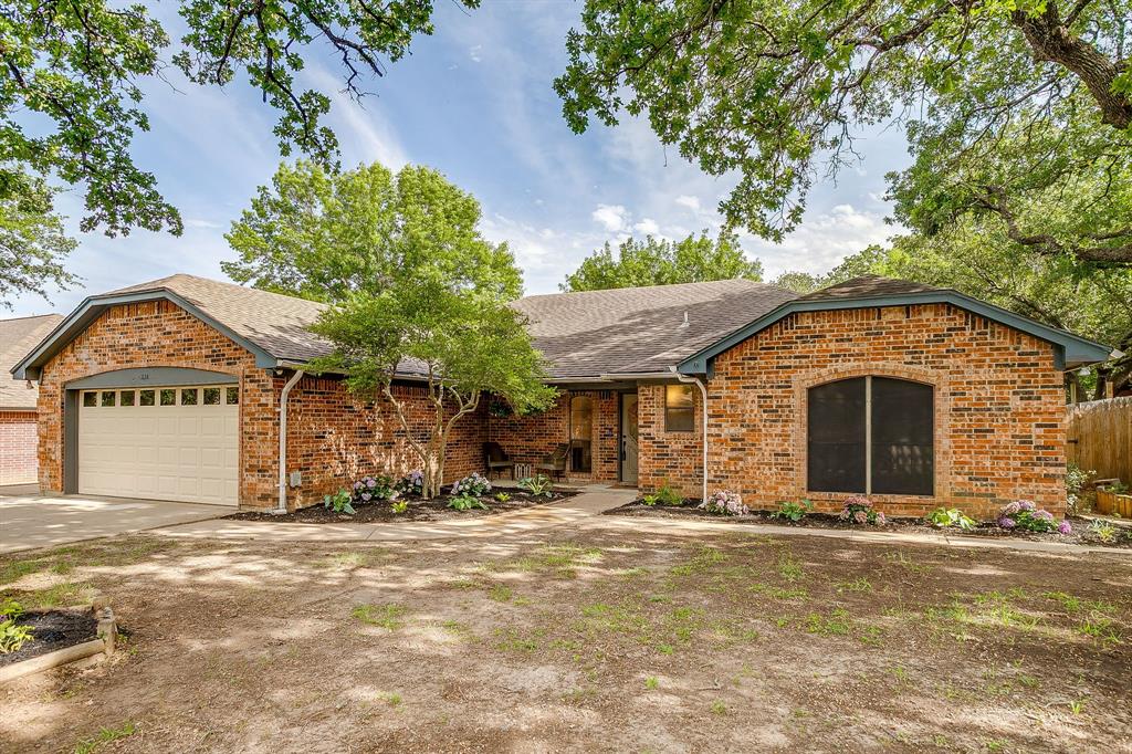 BACK BY POPULAR DEMAND TO NO FAULT OF THE SELLER OR HOME. Appraisal and Inspection Completed under prior contingent contract. Contact agent for any additional questions!  Welcome to this beautifully reimagined ranch-style home in the highly sought-after Foster Village Subdivision — where modern organic design meets everyday comfort. Featuring 3 spacious bedrooms, 2 updated baths, and a large versatile flex space perfect for a second living area, home office, playroom, or gym, this home offers both style and functionality.  Completely remodeled from top to bottom, every detail has been thoughtfully curated. Enjoy brand-new flooring throughout, stunning leathered granite and quartz countertops, designer ceiling fixtures, recessed lighting, and a beautifully remodeled fireplace that creates a warm and sophisticated focal point. The fully renovated kitchen blends natural textures with contemporary finishes, creating an inviting space ideal for entertaining and daily living.  Perfectly positioned within walking distance to local schools, Cross Timbers Park, and Adventure World Playground, this home combines modern living with an unbeatable location and community feel.  This is the one you've been waiting for — don’t miss your opportunity to call it home.