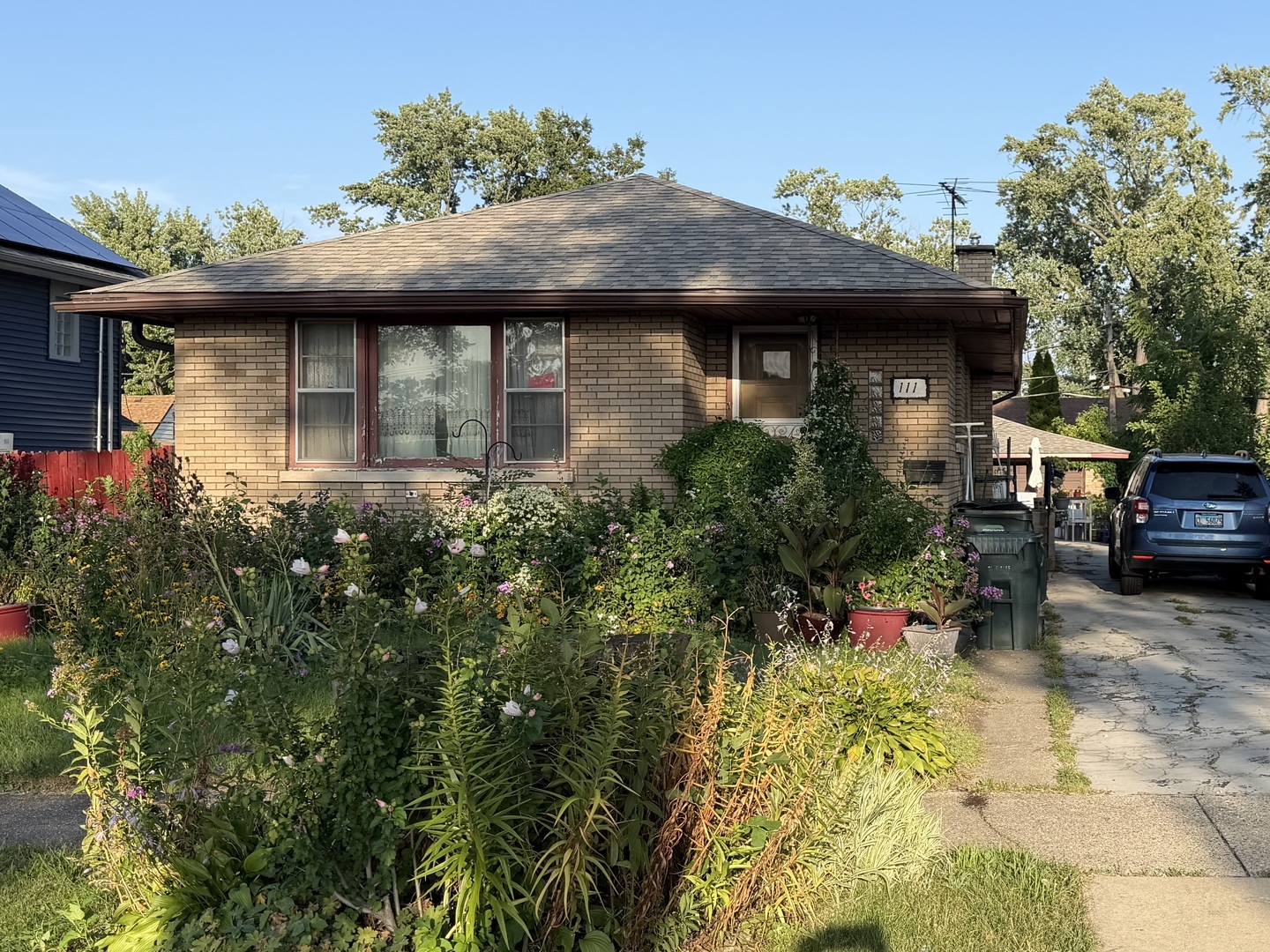 Long term owner occupied. 3 bedrooms 1.75  bath spacious brick ranch with full partially finished basement.  Hardwood floors in the living dining area. Roof 3 year old,Furnace,central air and water heater approximately 2 year old.The  windows are old but pretty sunlit rooms. Kitchen and baths need total remodelling,need painting. Use your creative imagination to turn the basement into a beautiful family space.If you love driveways for parking then look no further long driveway leads to two car detached garage. Driveway need to be redone. Very nice size lot for all your summer ideas and family fun.Close to expressways,grocery stores and schools.  Property being sold as is  . Only cash,conventional and rehab loans  NO FHA. Possession will be negotiable . Listing agent must accompany all showings no exceptions. 24 hrs notice is a must. Owner is packing/selling stuff so things everywhere. Please use your imagination to see beyond the personal items. Taxes prorated at 100 Buyer will be responsible for all the repairs that Village of Bellwood requires.NO BLIND OFFERS WILL BE ENTERTAINED. Listing office does not hold EM it will be held by sellers attorney.   NOT A FORECLOSURE OR SHORT SALE.