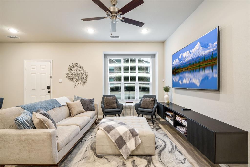 Welcome home to this beautifully maintained townhome in the highly sought-after Heritage Trail Community, where comfort and charm meet effortless living. From the moment you step inside, you’re greeted by a warm, home-like atmosphere filled with natural light that pours into every corner, creating a space that feels both inviting and uplifting. The kitchen, living room, and dining area flow seamlessly together—perfect for hosting loved ones, sharing everyday moments, or simply enjoying the ease of open-concept living. Upstairs, all bedrooms offer a peaceful retreat, along with a cozy space designed for unforgettable movie nights, complete with a projector—making it hard to ever want to leave home. The spacious primary bedroom is thoughtfully set apart from the others, providing a sense of privacy and relaxation. The primary suite features dual sinks and a sleek glass-framed shower, creating a spa-like experience you’ll look forward to every day. Ideally located just minutes from I-35, shopping centers, restaurants, and less than 20 minutes from UNT, this move-in-ready townhome perfectly blends comfort, convenience, and lifestyle. Don’t miss the opportunity to fall in love and make this stunning townhome yours.