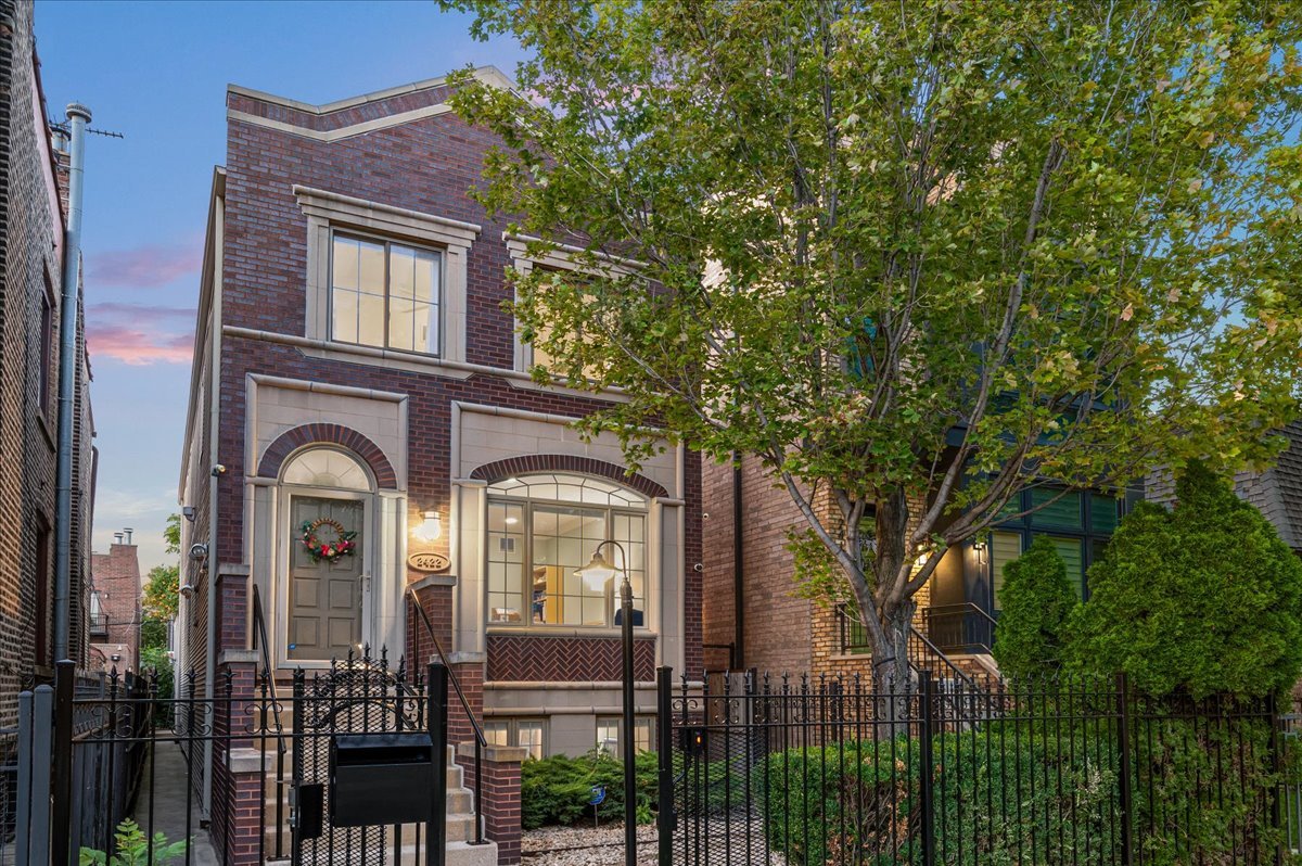 Magnificent SFH home in tranquil Smith Park. First time on the market - this beautiful home has been lovingly maintained by the original owner. Entering private gate, striking mocha limestone mulberry brick facade welcomes you to this 3 story 4000 sq ft home with 4 bed, 3.5 half bath, 2 car garage and multiple outdoor spaces. South facing formal living room is flooded with natural light  through stunning arched windows. French doors opens to gourmet kitchen featuring 42 '' crowned cherry cabinets, SS Appliances, granite counters with oversized island/breakfast bar. Wood burning fireplace makes the focal point of spacious family area which leads to rear deck + roof deck with vine covered trellis - perfect for summer fun and entertaining. 2nd floor has 3 generously-sized bedrooms 2 baths and full-size side by side laundry. Luxurious Primary Suite with cathedral ceiling easily accommodates king size bed with nightstands + sitting area and leads to a true spa bath with double vanity, separate whirlpool tub and steam shower. Lower level has recreation room with 9' ceilings, 4th bedroom + 3rd full bath, 2nd fireplace, mechanical/utility room with laundry hook ups for  secondary laundry room if needed. You can also add a wet bar near the staircase. This beauty is turn-key with hardwood floors throughout, excellent layout, fresh paint, LED lighting + abundant storage. Only half block to gorgeous Smith Park - with swimming pool, tennis court, pickleball court, Fieldhouse, playground and soothing green space. This neighborhood is a hidden gem bordering Ukrainian Village, West Town, East Village, and just minutes to Metra station to go into the city center or out to suburbs. Ample choices of great restaurants, bakeries, breweries, art galleries and boutiques nearby. Truly A+ location with easy access to Grand and Chicago + surrounding areas of Fulton Market, Wicker Park and Bucktown as well expressway. Dream home with style, convenience and functionality!  A home for all seasons. A home you can grow into. What's more to ask for? Please present FINAL and BEST by noon (CST) on Monday, October 6, 2025.