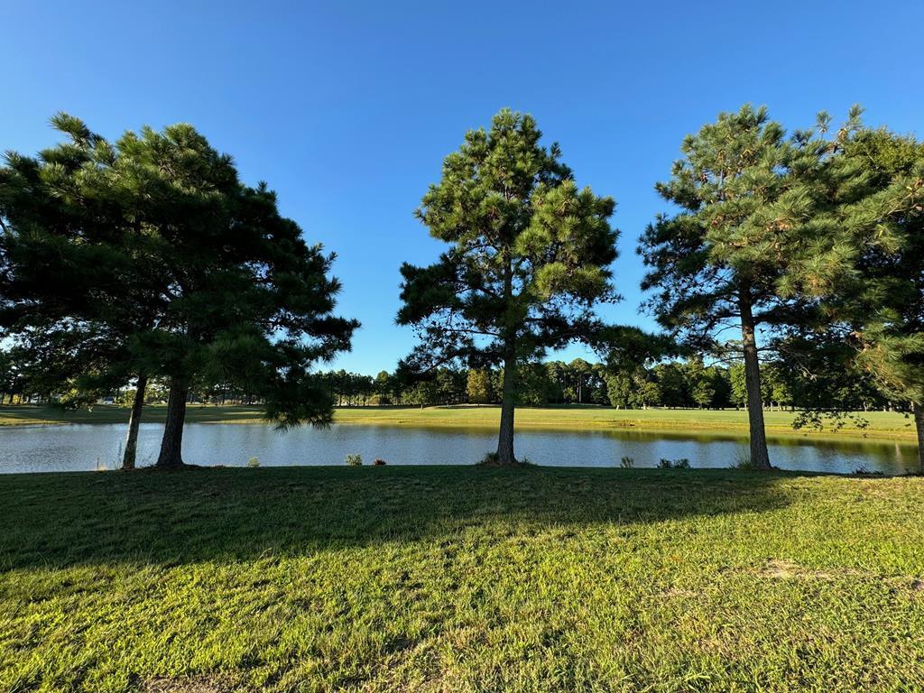 Gorgeous homesite in Bayside Village, set along the sparkling waters of Golden Bear Pond and overlooking the 9th hole of the Nicholas Course. Wake up to shimmering views and unwind with breathtaking sunsets over the fairway. Located in the sought-after Bay Creek community, you'll enjoy premier amenities and easy access to the charming historic district. Let the Builders Guild help bring your dream home to life with custom plans tailored to your vision. A great opportunity in an unbeatable setting—now is the perfect time to make it yours!
