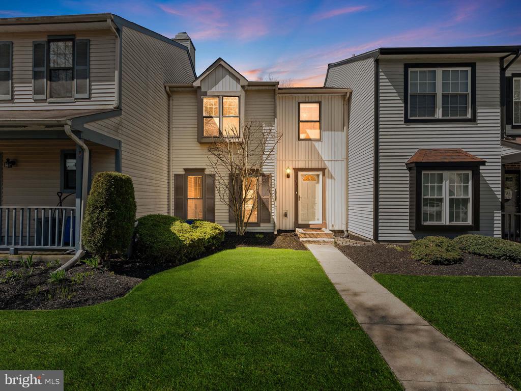 Nestled in the charming community of Reynard Run, this delightful townhouse offers a perfect blend of comfort and style. Built in 1988, this traditional home has been meticulously maintained and is in excellent condition, ready for you to move in and make it your own. As you step inside, you are greeted by an inviting open floor plan that seamlessly connects the living and dining areas. The spacious layout is enhanced by beautiful laminate wood floors and recessed track lighting, creating a warm ambiance perfect for both relaxation and entertaining. The kitchen is nicely updated , featuring a NEWER stainless steel REFRIGERATOR, GRANITE countertops, a breakfast bar for additional seating and plenty of cabinetry... all designed for ease and functionality. The dining area is bathed in natural light from the glass sliders leading to the rear yard, making it an ideal spot for morning coffee or casual meals. This home boasts two cozy bedrooms, each designed for comfort and tranquility. Each bedroom has access to the bathroom making this feel like two primary suites. The primary bath features a skylight for added sunlight, a luxurious soaking tub, a stall shower and a dual vanity providing a spa-like retreat right at home. Additional interior highlights include an attic with a fan for added ventilation, wainscotting in the first level bathroom for a touch of elegance, and a convenient main floor laundry area. Step outside to discover the exterior features that enhance your outdoor living experience. The property is adorned with a retractable awning that allows shading over your deck to enjoy those hot summer days. Exterior lighting creates a welcoming atmosphere. Enjoy the beautifully maintained lawn, complete with a front yard underground sprinkler system, and take advantage of the community amenities, including tennis courts and well-lit sidewalks for evening strolls. Parking is a breeze with two dedicated spaces in the parking lot, along with ample on-street options for guests. The association takes care of common area maintenance, lawn care, and snow removal, allowing you to enjoy a low-maintenance lifestyle. Located in a vibrant neighborhood, you'll find a variety of local amenities just a stone's throw away. Explore nearby parks, shops, and dining options that cater to all tastes. The community spirit is palpable, making it a wonderful place to call home. Other items to take into consideration that have already been updated for you... Roof 2014, Furnace and AC 2019, Hot Water Heater 2022. This townhouse is not just a property; it's a place where memories are made. Experience the comfort and convenience of Reynard Run, where every detail has been thoughtfully considered for your enjoyment.