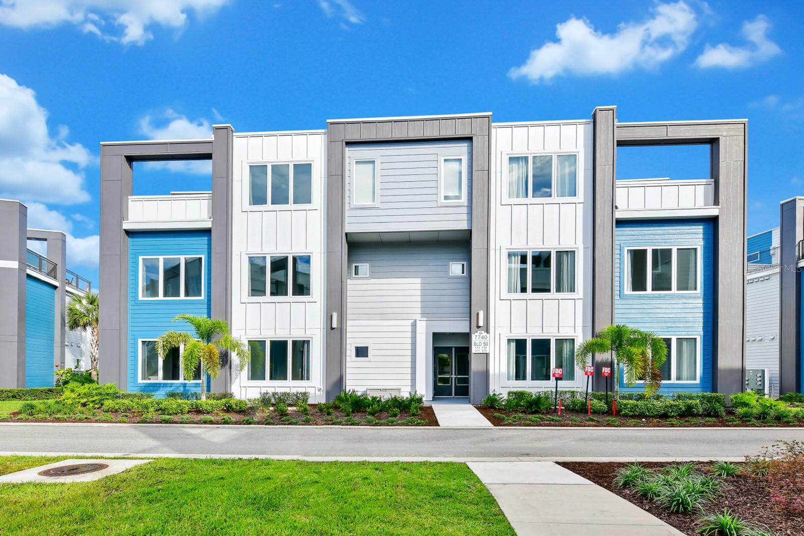 Experience contemporary luxury in this stunning, modern condo in the highly sought-after Spectrum+ at Reunion Resort—one of Central Florida’s premier golf destinations, just minutes from Walt Disney World. Offered FULLY FURNISHED and turnkey, this residence is ideal as a primary home, second home, or investment, with the added convenience of an on-site property management company. The spacious open floor plan features 3 bedrooms and 2.5 baths with modern finishes throughout. The large kitchen is a standout with a stainless-steel Samsung appliance package including a gas range, plus a beautiful center island perfect for gathering and entertaining. Natural light fills the living area and leads to sliding glass doors opening to an expansive paved patio with panoramic golf course views—ideal for relaxing or hosting guests. Enjoy resort-style living with access to the Spectrum+ pool, fully equipped gym, and the incredible Reunion Water Park featuring a lazy river and water slides. Reunion Resort spans 2,300 acres and offers THREE signature golf courses: Tradition by Jack Nicklaus, Legacy by Arnold Palmer, and Independence by Tom Watson, plus pro shops, multiple community pools, tennis courts, conference facilities, and a variety of dining options. Don’t miss this opportunity to own an exceptional home where luxury, leisure, and location come together.