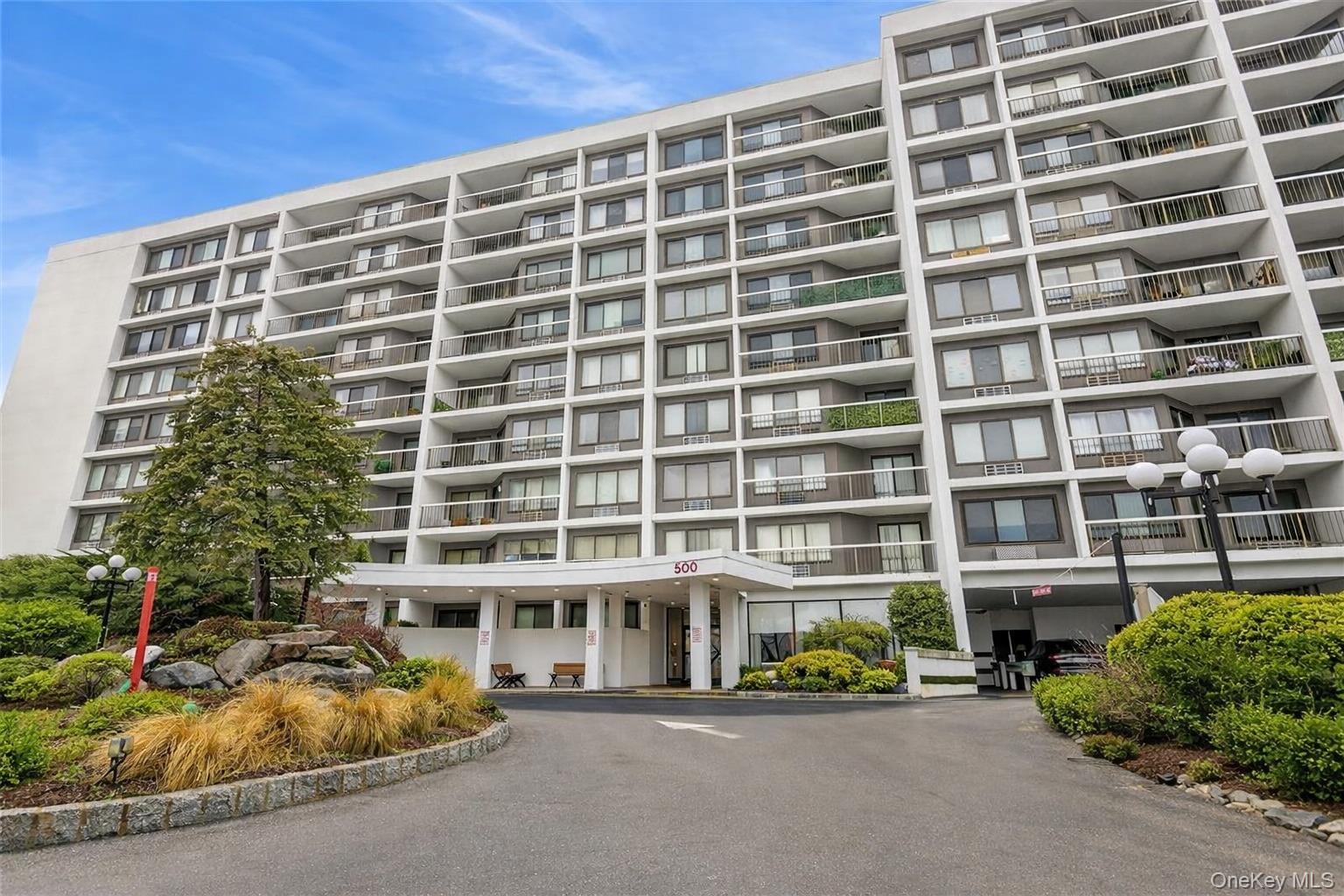 Beautifully renovated 2-bedroom, 2 full bath residence located in the sought-after High Point community in Hartsdale. This thoughtfully updated home features a spacious primary suite with a Jacuzzi tub and TV, custom California Closets, two of which are walk-in closets in each bedroom. Additional highlights include a gas fireplace, private balcony with open views, white stainless steel appliances in the eat-in kitchen, and convenient laundry facilities located on the same floor.  Assigned garage parking and dedicated Storage room. The laundry is on the same floor. New sliding door to the balcony. High Point is a meticulously maintained gated community with a staffed 24-hour gatehouse, accessible lobby with elevators, and an extensive amenity package including a community pool (with pool chairs and umbrellas), clubhouse with kitchen, card room, playground, fitness center, sauna, bike storage, and on-site management.Ample guest and additional parking is available. Conveniently located near Metro-North train service, major commuter routes including the Bronx River Parkway and I-287, as well as shopping, dining, parks, and recreation. Located within the Greenburgh Central School District.An exceptional opportunity to enjoy comfort, convenience, and full-service community living in a prime Hartsdale location.