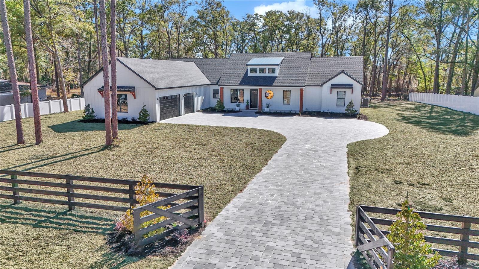 Step into this brand-new 4-bedroom, 3.5-bath farmhouse where timeless charm meets luxury design. Set on over an acre of land, this home offers the peace and space of country living — without the restrictions of an HOA. Who doesn't want 2 laundry rooms and 2 dishwashers with a 3 car garage. The extras are endless in this new floorpan. Gas fireplace and gas stove with vaulted ceilings just isn't something you will find in most homes. From the moment you pull up, you’ll fall in love with the clean farmhouse lines, inviting front porch, and attention to detail that defines BRIJE Homes. Inside, discover an open-concept layout with upgraded finishes throughout — from the upgrade cabinets and trim work to the elegant flooring. The gourmet kitchen opens to a spacious great room, creating the perfect gathering spot for family and friends.A private owner’s suite offers a spa-inspired bathroom and generous walk-in closet, while three additional bedrooms provide space for family, guests, or a home office. Enjoy covered outdoor living with plenty of room to add a pool, workshop, or garden — the possibilities are endless.Most of yard is fenced and includes a gate to enter the home with paver driveway and turned garage. Highlights:    •    New construction with upgraded designer finishes    •    4 Bedrooms | 3.5 Bathrooms | Open-concept design    •    Sits on 1+ acre — room for toys, animals, and future projects    •    No HOA – freedom to live your way    •    Built by BRIJE LLC, known for quality and timeless farmhouse styleIf you’ve been dreaming of a modern farmhouse lifestyle close to town but surrounded by open space — this is it.  There are site changes made by the builder . Can't verify floorplan and images to be exact as site changes are made.