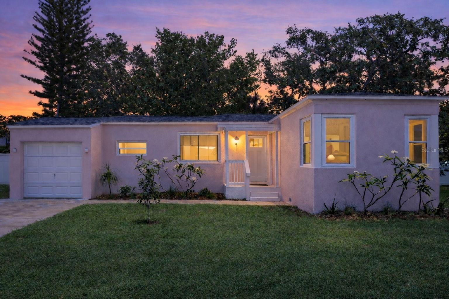Tucked away in the heart of Dunedin, Florida, just minutes from the waterfront, the Pinellas Trail, and vibrant downtown Dunedin, this beautifully restored 1940 bungalow is proof that great design can make a home feel far larger than its square footage.Completely reimagined from top to bottom, this one-of-a-kind home blends vintage Florida charm with elevated, modern finishes. The result is a warm, inviting retreat that feels intentional, stylish, and easy to live in. Whether you’re looking for a full-time residence, a seasonal escape, or a low-maintenance second home near the coast, this property delivers both lifestyle and location.Some images have been enhanced to highlight the property's features.Inside, the open-concept layout lives large and flows effortlessly. Thoughtful design choices, layered textures, and curated finishes create a space that feels cozy yet refined. This is not a standard renovation. Every detail was hand-selected to honor the home’s history while enhancing comfort and functionality.Major updates include new HVAC, plumbing, electrical, and hurricane-rated windows, offering modern peace of mind. Design highlights include custom recycled glass and porcelain tile, Kingston Brass vintage-style hardware, hand-painted wallpaper, statement lighting, and warm acacia butcher block countertops.Step outside and you’ll find where this home truly shines. The expansive, fully fenced backyard was designed for year-round outdoor living and entertaining. Enjoy a custom paver patio with multiple gathering areas, a luxury Paradise Grills outdoor kitchen, a movie lounge, sun deck, and open lawn. It’s the perfect setting to dine, relax, host friends, or simply soak in the Gulf Coast lifestyle.The home sits approximately three feet above ground level and remained high and dry during the last hurricane season, adding another layer of confidence for coastal living.All of this is just a short golf cart ride to Main Street Dunedin, where you’ll find local shops, breweries, restaurants, festivals, and waterfront parks. Move-in ready and truly turnkey, with furnishings available separately.If you’re searching for a renovated home in Dunedin with character, walkability, and standout design, this is a rare opportunity. Thoughtfully restored, ideally located, and designed for the way people actually live, this home is special, and it shows.Some photos have been enhanced to highlight the property's features.