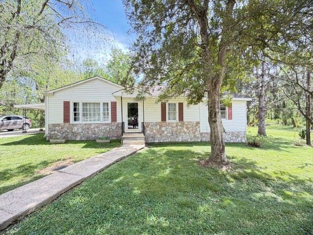 Opportunity is knocking!! This 4 bedroom, 2 bath home is perfect investment property or starter home for someone ready to make it their own. Featuring a beautiful 1 acre yard with plenty of space to enjoy, garden, or entertain, this property offers great bones and endless potential. With a little love and vision, this could truly shine. Don't miss your chance to turn this diamond into something special.  Selling AS IS!