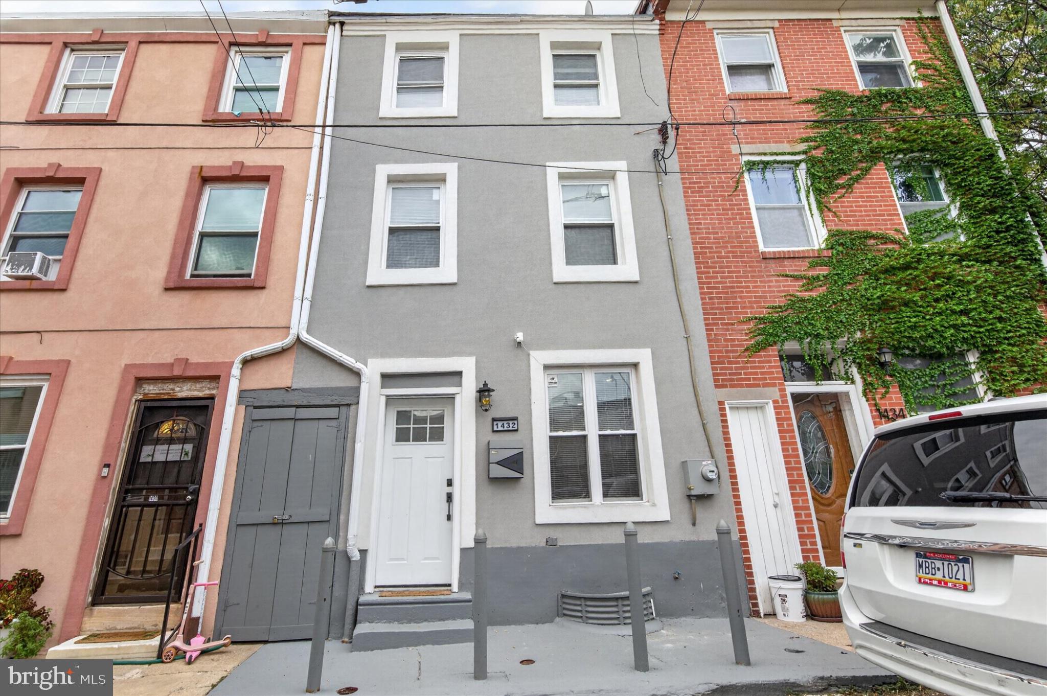 EXTRA-WIDE 4-BEDROOM | 4-BATHROOM | PRIVATE BACKYARD | LUXURY PRIMARY SUITE | SOUTH KENSINGTON This is the one you’ve been waiting for! Welcome to 1432 N Leithgow St, an impressive extra-wide home where dramatic architecture, modern luxury, and incredible city living come together in one of Philadelphia’s hottest neighborhoods.From the moment you walk through the door, you’ll notice the difference. Soaring ceilings, an expansive open-concept layout, high-end finishes, and oversized sliding glass doors create an incredibly bright and inviting main living space. The sliding doors open directly to your private backyard — a rare Philadelphia luxury that gives you the perfect space for entertaining, summer BBQs, relaxing, or letting your four-legged friends enjoy some fresh air.The show-stopping chef’s kitchen is built for both everyday living and entertaining, featuring custom cabinetry, premium appliances, quartz countertops, and a designer backsplash that ties the space together beautifully.Head upstairs to find two spacious bedrooms and a full bathroom. Continue to the third floor, where the entire level is dedicated to an incredible primary suite. This private retreat features a walk-in closet, office nook, exposed brick, and a spa-inspired bathroom with custom tile — the perfect place to unwind at the end of the day.A fourth bedroom and additional full bathroom provide the flexibility today’s buyers are looking for, whether you need a guest room, home office, nursery, or additional living space.And there’s even more downstairs! The finished basement provides valuable additional living space that can be transformed into a home gym, media room, office, entertainment lounge, workshop, or whatever fits your lifestyle.But the house is only half the story. Location is everything, and this home puts you right in the middle of the action. Enjoy everything South Kensington, Fishtown, and Northern Liberties have to offer, with acclaimed restaurants, coffee shops, nightlife, fitness, and entertainment just minutes away. Grab dinner at Laser Wolf, enjoy a meal at Mulherin’s, stop by Front Street Café, or explore everything happening along Frankford Avenue and Front Street.Fitness enthusiasts will love having Movement nearby, offering approximately 41,000 square feet of climbing, yoga, fitness, and more.For commuters, getting around the city is easy with public transportation, nearby bike lanes, I-95, 676, and area bridges all within convenient reach.Extra-wide. Four bedrooms. Four full bathrooms. Private outdoor space. Finished basement. Incredible primary suite. Prime South Kensington location.This home checks the boxes that are getting harder and harder to find in Philadelphia.Don’t wait — schedule your private showing today and see why 1432 N Leithgow St needs to be at the top of your list!