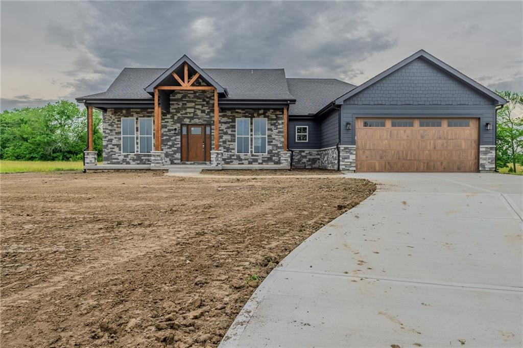 This stunning brand-new ranch-style home, located in the desirable Deer Creek Lake Subdivision, offers 3 bedrooms and 2.5 bathrooms, all set on a spacious 1.71-acre lot. Enjoy the ease of single-level living with an open, inviting floor plan that features a modern kitchen with a large walk-in pantry, a large living area, and a bright dining space perfect for family gatherings. The spacious primary suite includes an en-suite bath with a soaking tub, a separate shower, and dual vanities. Two additional bedrooms offer ample closet space and easy access to the hall bathroom. Step outside onto the large covered deck, with a beautiful view of the trees in the backyard. The full, unfinished basement provides endless possibilities for storage, a workshop, or future living space expansion. Located in the peaceful Deer Creek Lake community, this home offers both privacy and convenience, with access to the natural beauty of the area and nearby amenities. The home is estimated to be completed in June 2025.