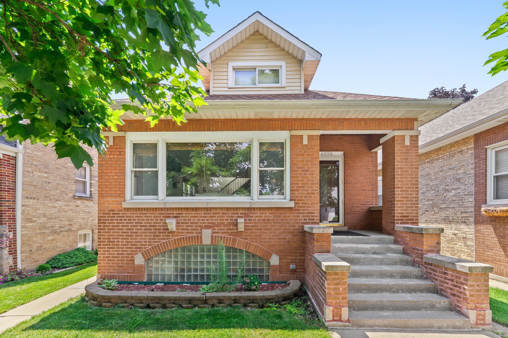 Attention Portage Park/Dunning Buyers!  Don't miss this beautifully maintained brick bungalow featuring 3 bedrooms, 3 full baths, and a spacious loft currently used as a home office. Enjoy recessed lighting throughout, gleaming hardwood floors, and generously sized rooms.    The updated kitchen boasts stainless steel appliances, while the fully finished basement offers a large rec room and a jacuzzi, perfect for entertaining or relaxing.  Extra large backyard with a back-porch perfect for outdoor BBQs or large gathering.    Recent updates include:    Newer windows  New forced air and central A/C system  Complete tear-off roof (2021)  Located within walking distance to parks, shopping, and public transportation. Absolutely move-in ready.