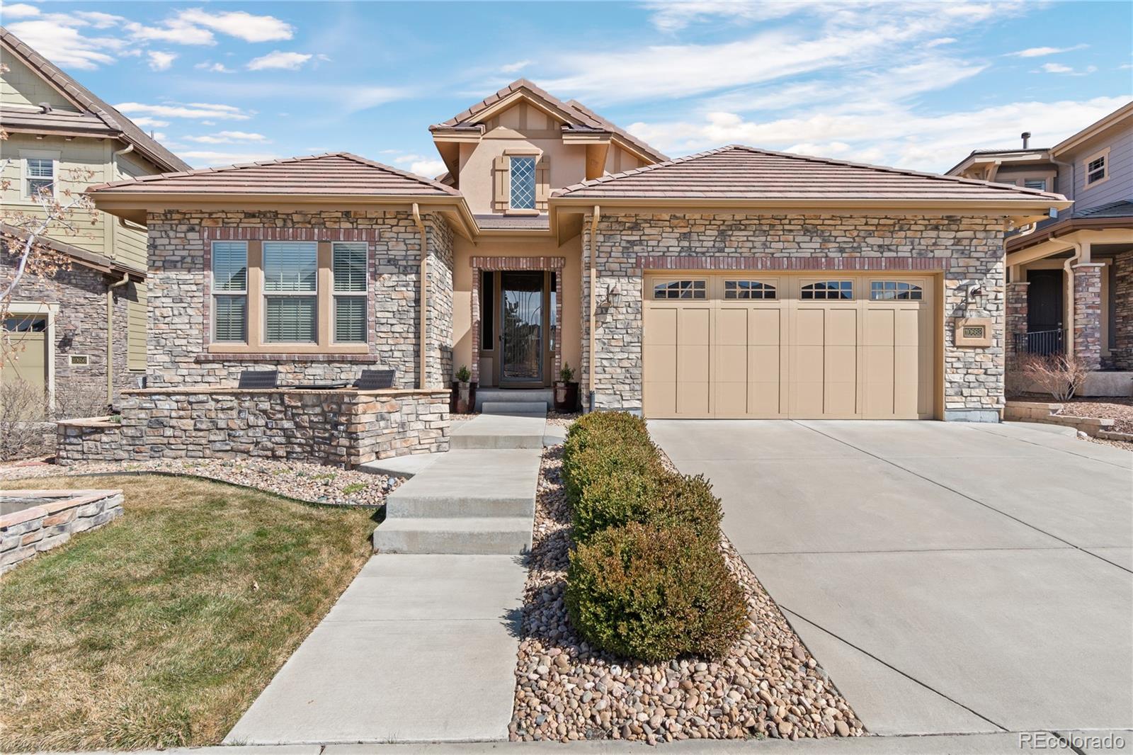 Welcome to 10662 Skydance Drive.  This lovely one-owner ranch-style home is situated in the exclusive, gated community of BackCountry, Highlands Ranch.  From the moment you enter the expansive foyer with its 12 foot ceilings you will notice the quality of the  construction and attention to detail throughout this home, from the engineered wood floors to the granite countertops and the top of the line Kitchen-Aide appliances.  The owners have added more custom cabinets, with granite countertops, to the kitchen and dining room alcoves for additional storage space, and recently added new carpet in the bedrooms. The expanded granite kitchen island seats 5 around the island. The Primary Suite boasts 10'6" vaulted ceilings, a gorgeous 5-piece bath with 2 person shower, and large walk-in closet. The 8 foot doors and 9 foot ceilings throughout the home add to the expansive feel of the home. The unfinished basement, with its 9'6" ceilings is the perfect mancave.  If you are looking for a home with mountain and city views on an Open Space, this should be your next home.  You can enjoy the mountain views with afternoon sunsets from the custom built front stone patio or you can relax on the covered deck or lower patio and take in the city and open space views.  The Sundial House, with its pools, workout rooms, meeting rooms, and Happy Hour is reserved for residents and their guests.  The miles of trails through the neighborhood and in the adjacent 8200-acre BackCountry Wilderness Area will provide you hours of relaxing enjoyment.
